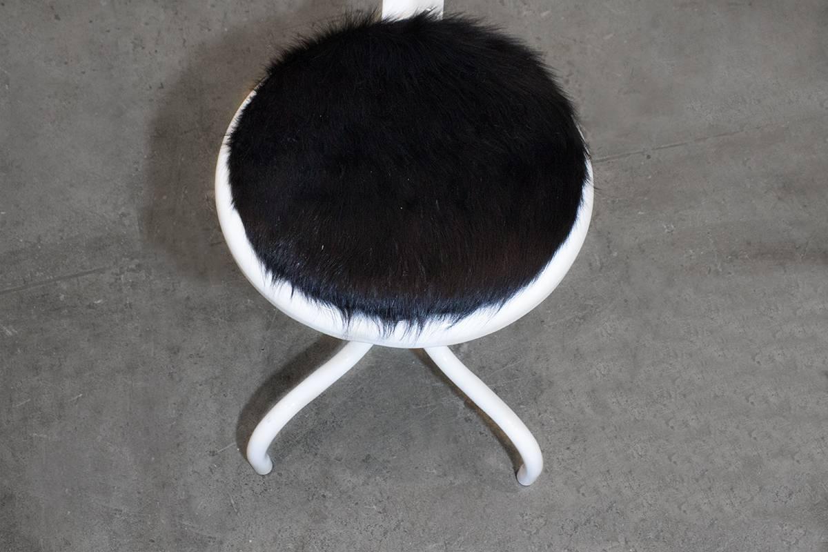 This is a one of a kind "Frankenstool" put together from miscellaneous stool parts. Newly powder coated in gloss white with hair-on cowhide seat. A Rehab vintage original. 
Measures:
15 1/2" diameter.
Fixed seat height: 18.5",