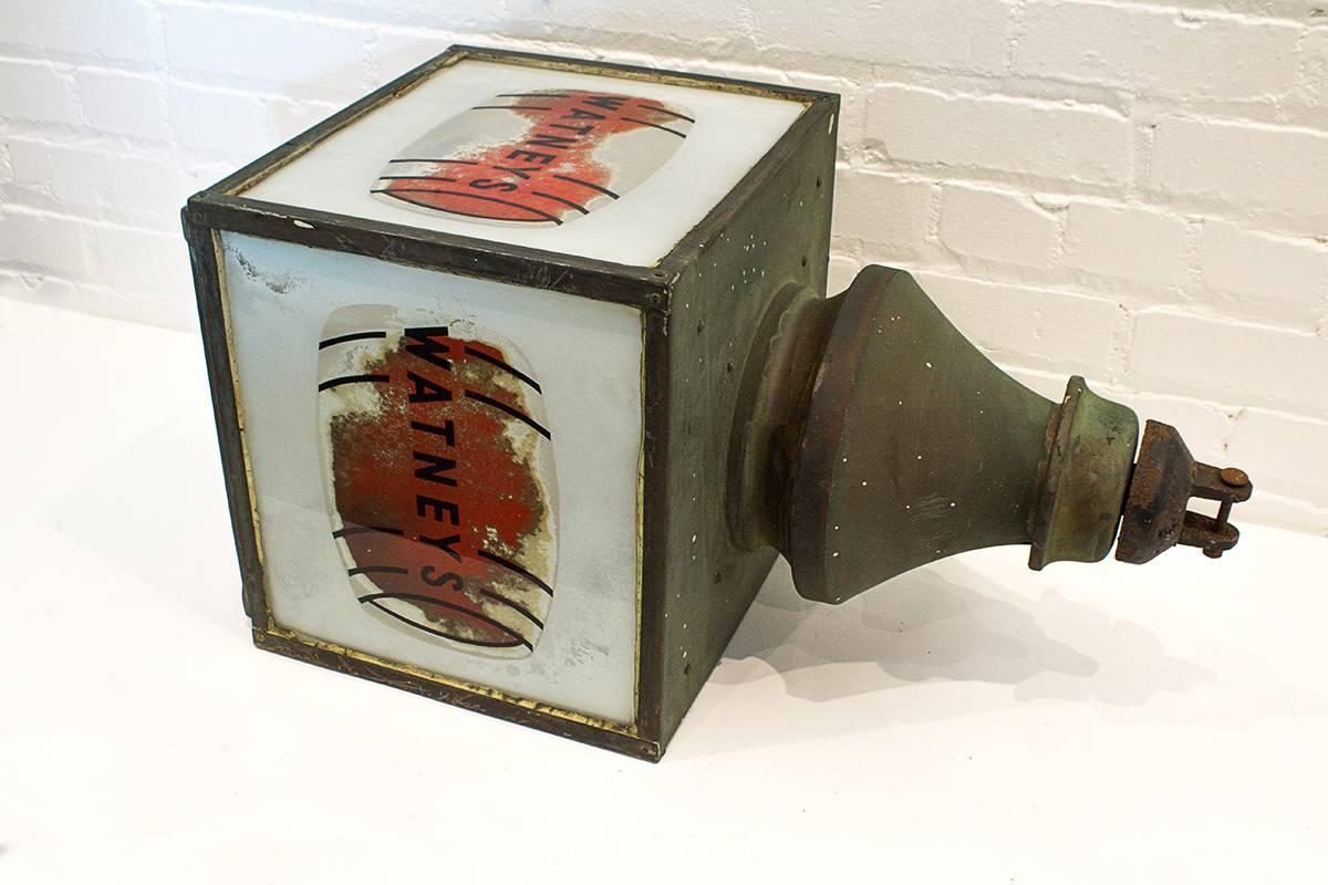 Fantastic Watney's Red Barrel hanging pub lamp from the 1930s. Copper frame with great patina. Frosted glass panels with the famous red barrel. One-panel missing. Will make the perfect wall sconce. A must have for the breweriana collector.

 