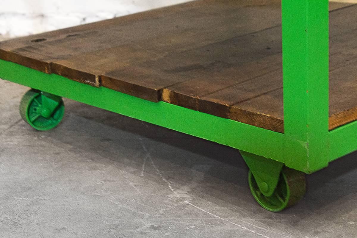 Funky custom-made rolling display cart with pipe clothes hanger and wood slat shelf below. Straight out of the now defunct Kitson store on Robertson Blvd, Los Angeles. Great piece for retail display or clothes storage in a closet-less apartment or