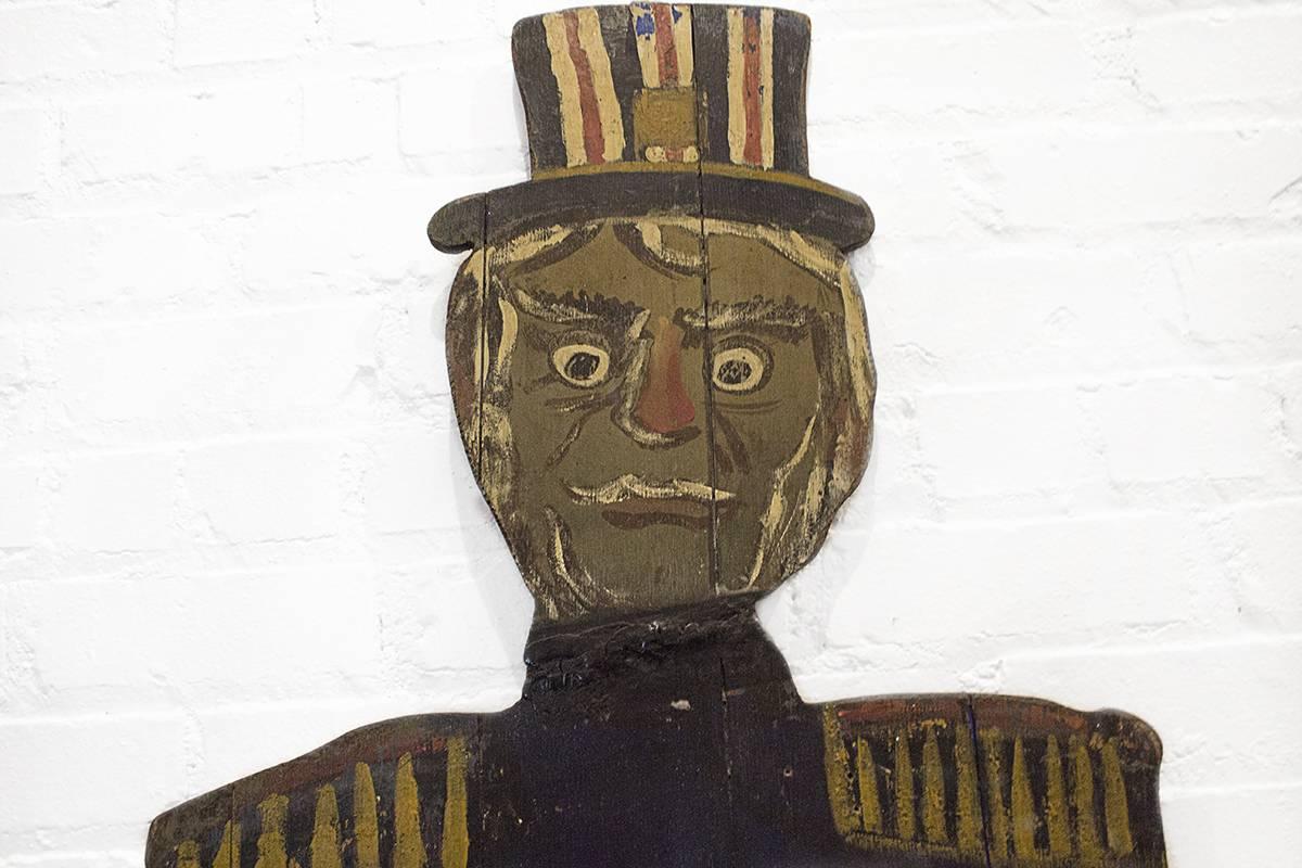 Fabulous one of a kind Folk Art painting on wood of the police man from J. Sloan's bar in West Hollywood, CA. Original paint. Right knee is worn from a long time custom of patrons touching it for good luck.

Opened in 1919, J. Sloan's was known as