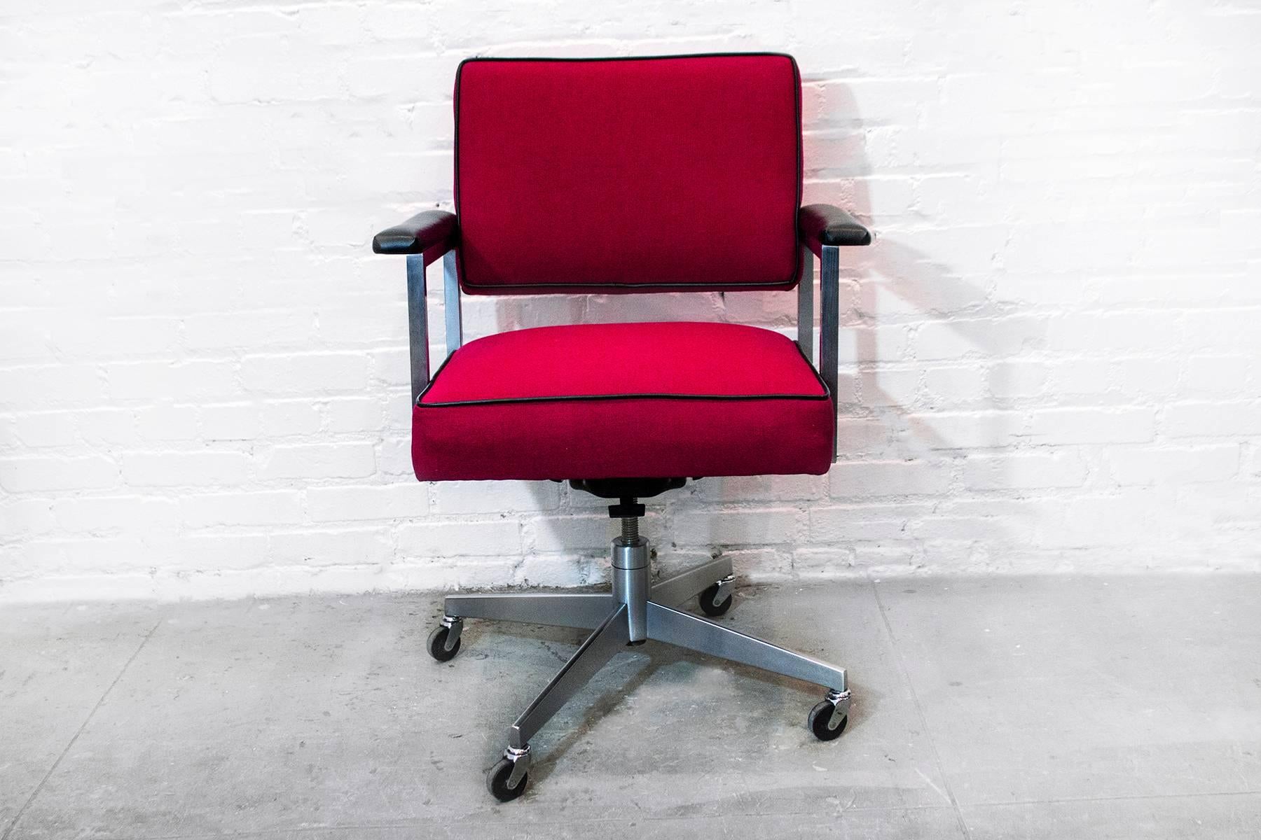 This 1980s chrome "workhorse" has been polished up and reupholstered in a fabulous red micro-linen. A sturdy, modern office chair with plenty of POP!

Dimensions: 21" D x 25" W x 36" H x 22" seat height.