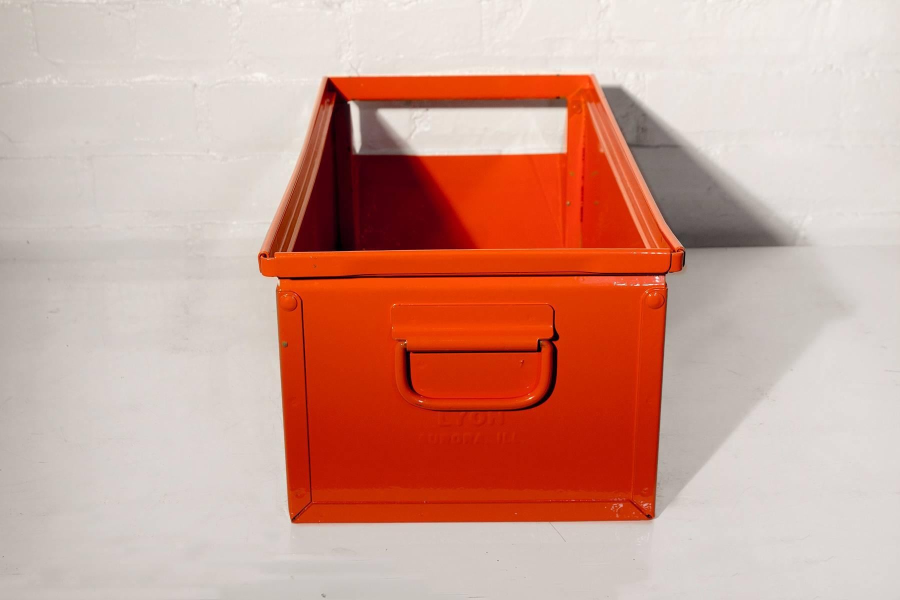 Vintage Lyon manufacturing Industrial storage bin newly refinished in safety orange powder coat finish. A new twist on the machine age olive drab bin. Great for books, toys, towels or just plain "stuff".

Dimensions: 10" D x