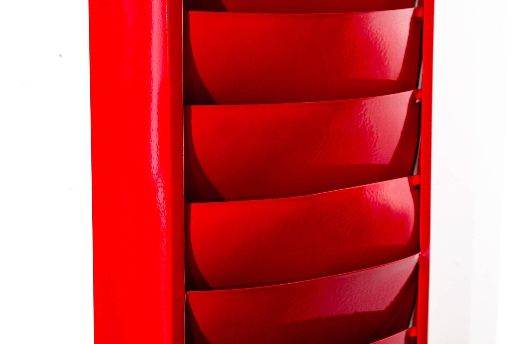 Rare 30 slot vertical file holder refinished in gloss red power coat. Wall mountable. Unique home of office organizing piece.

Dimensions: 4