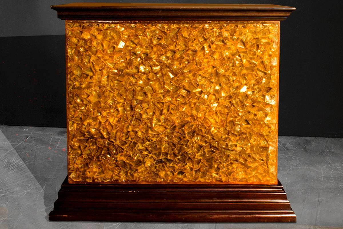 This unique piece was recently acquired from the "living estate" sale of Dr. Phil McGraw. The body is constructed from hundreds of chunks of Lucite that produce a "block of ice cubes" effect. The light inside creates a fabulous