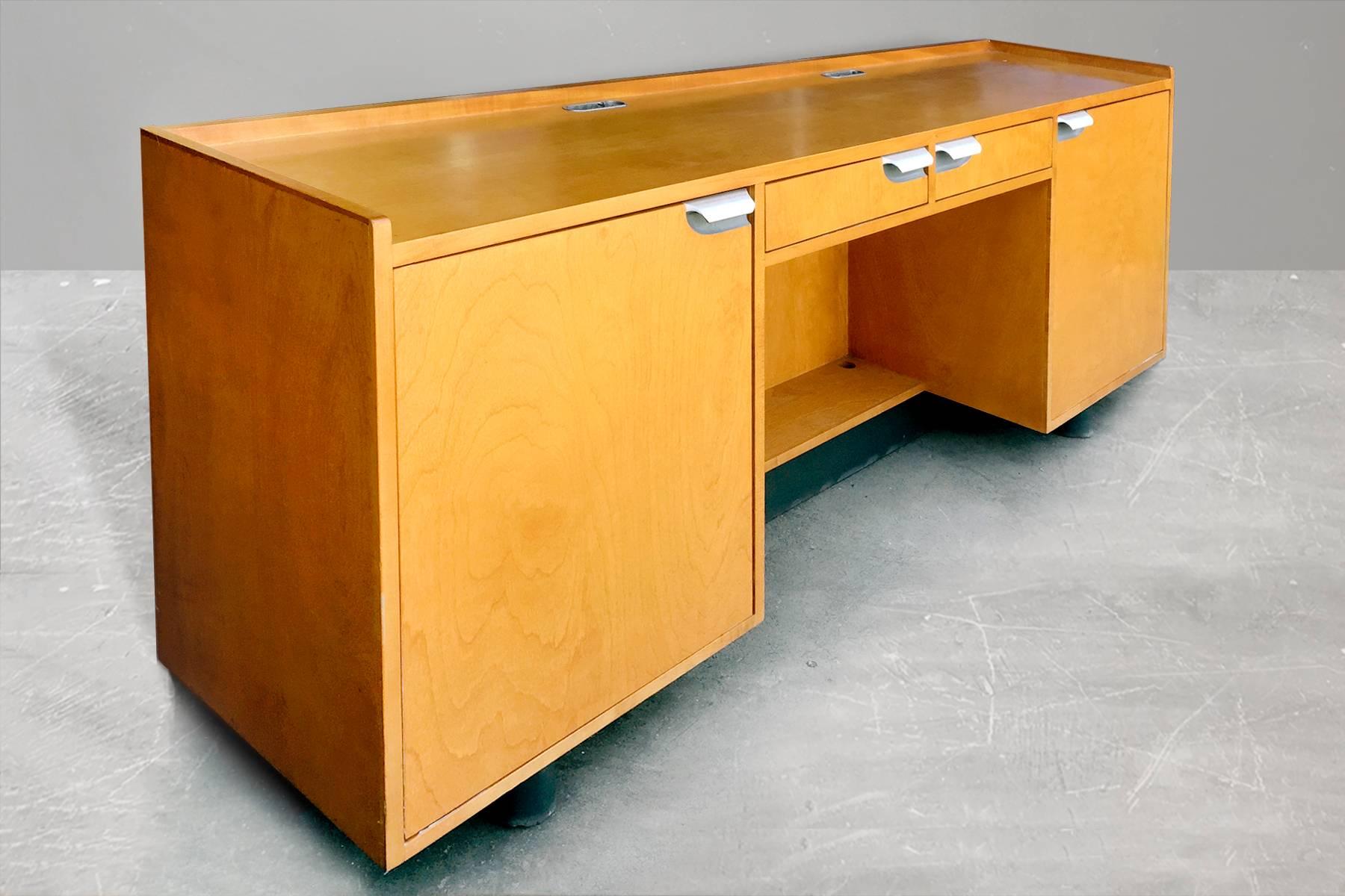 An extremely rare credenza / console desk by KEM Weber for the Walt Disney Animation Studios, circa 1990. Weber's iconic line of furniture for Disney was originally created in the 1940s; Disney owns these copyrighted plans and reproduced Weber's