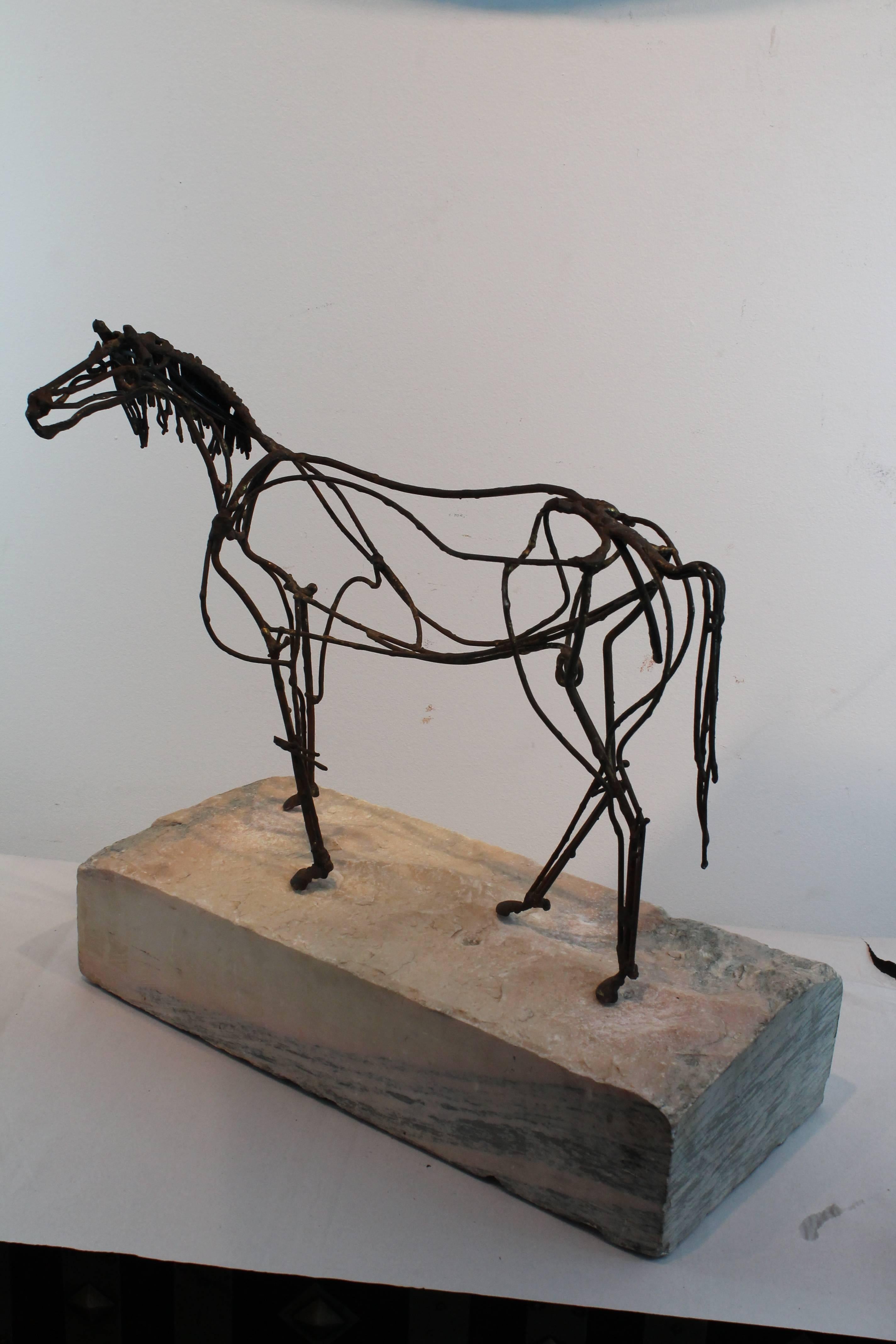 Wonderful modernist graphic welded horse.
 Lyrical lines like a sketch in three dimensions.
Horse sculpture sets upon a marble block plinth.