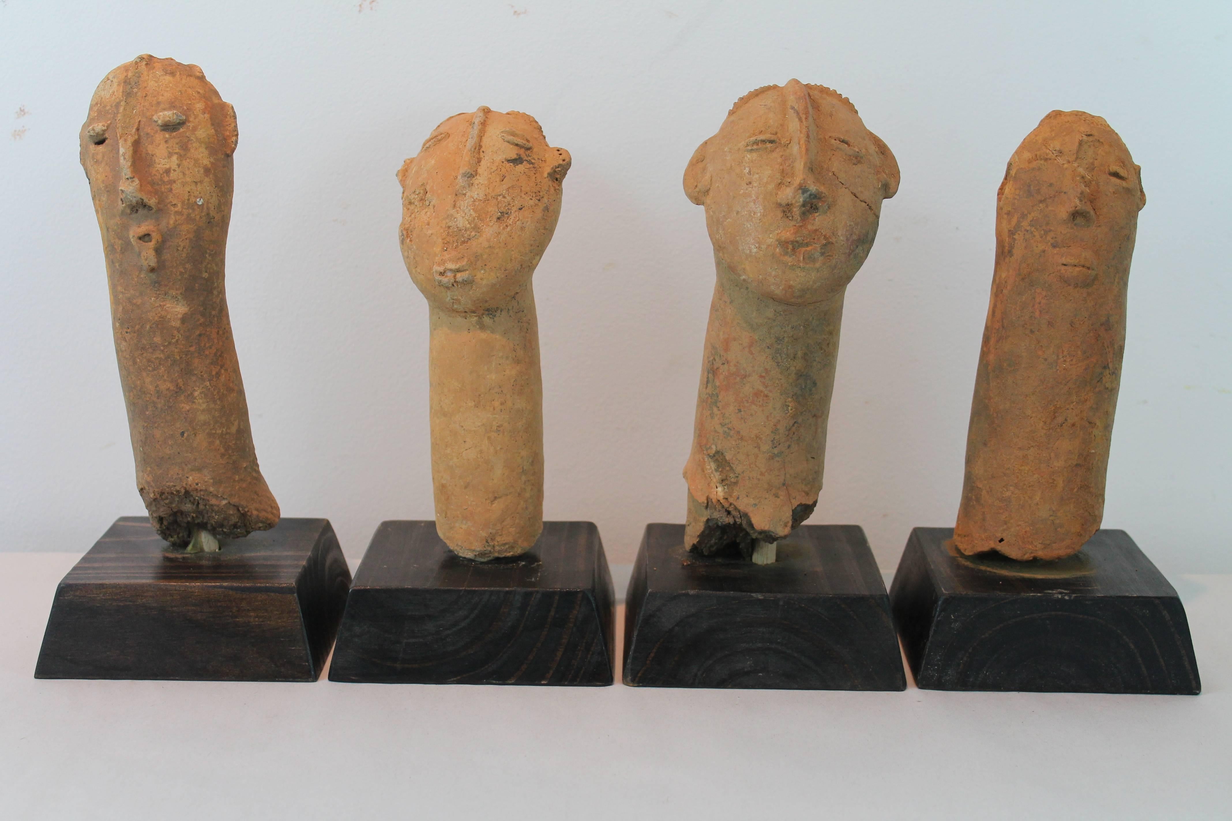 Terracotta heads from the Bura civilization, Niger (3rd-11th Century).
Mounted on wood plinths.
They are offered individually.