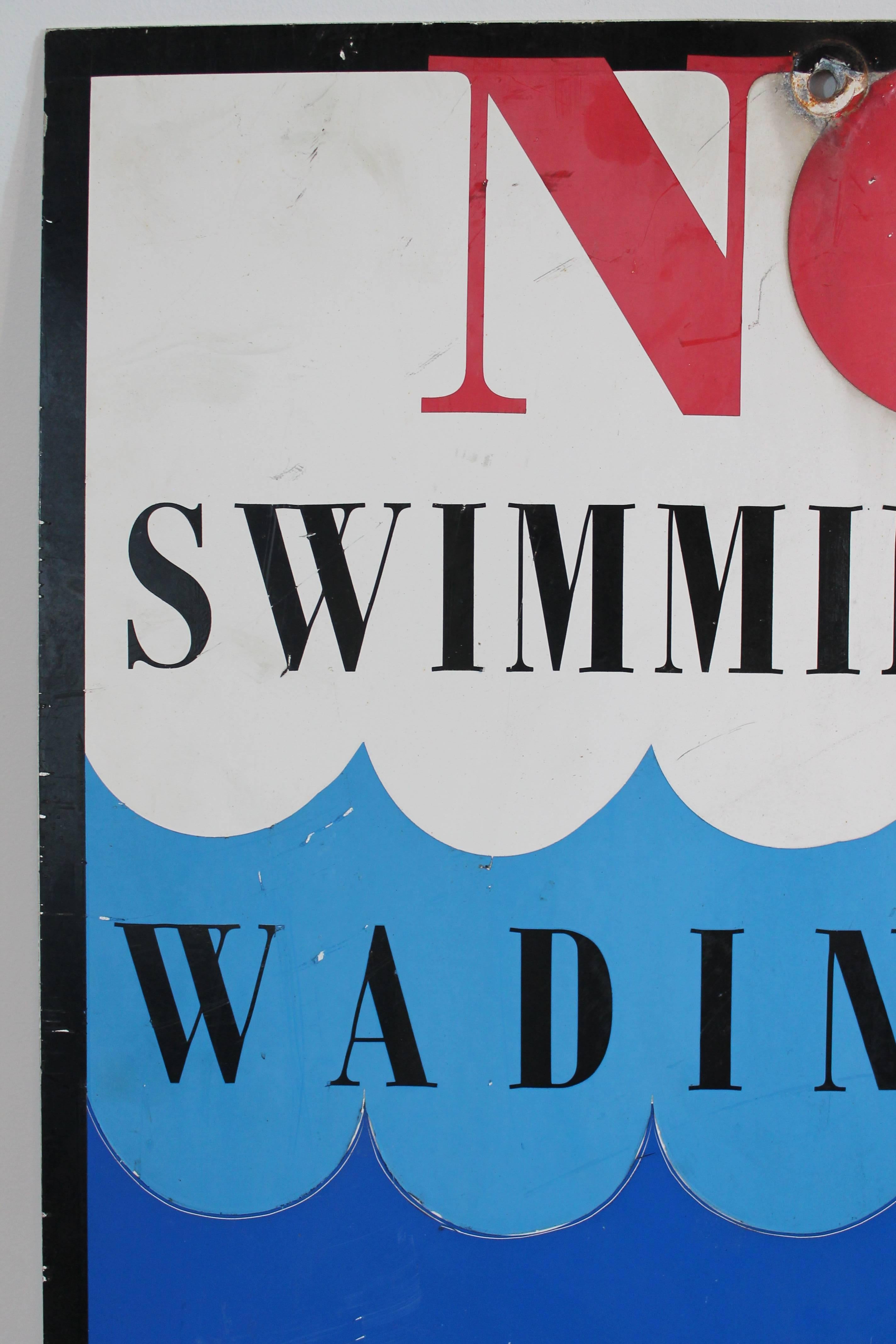 Great graphic metal park sign from the mid-20th century.
No swimming. No wading. No fishing.
Great surface.