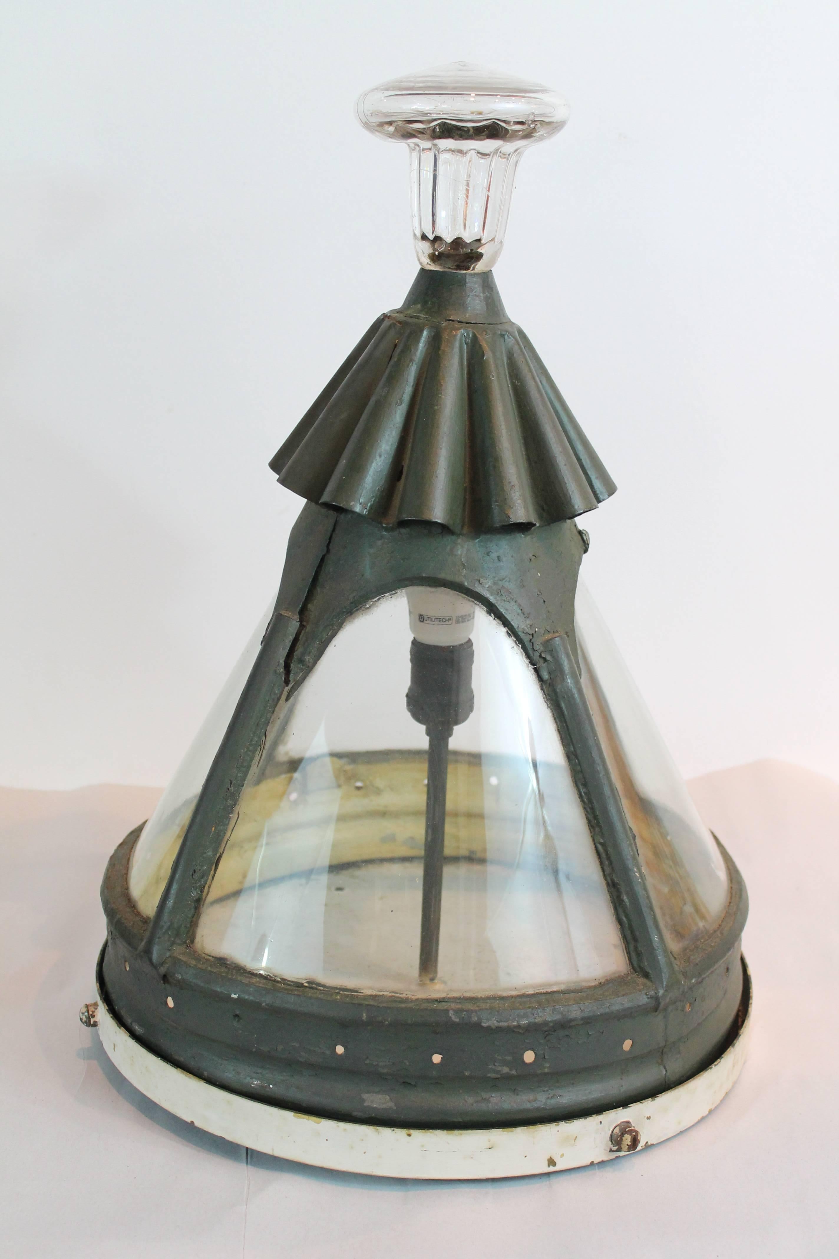 Very unusual sculptural 19th century painted iron and glass flush mount ceiling fixture. Featuring a fluted peak and a large glass finial. 
Could be use outdoor or indoor.