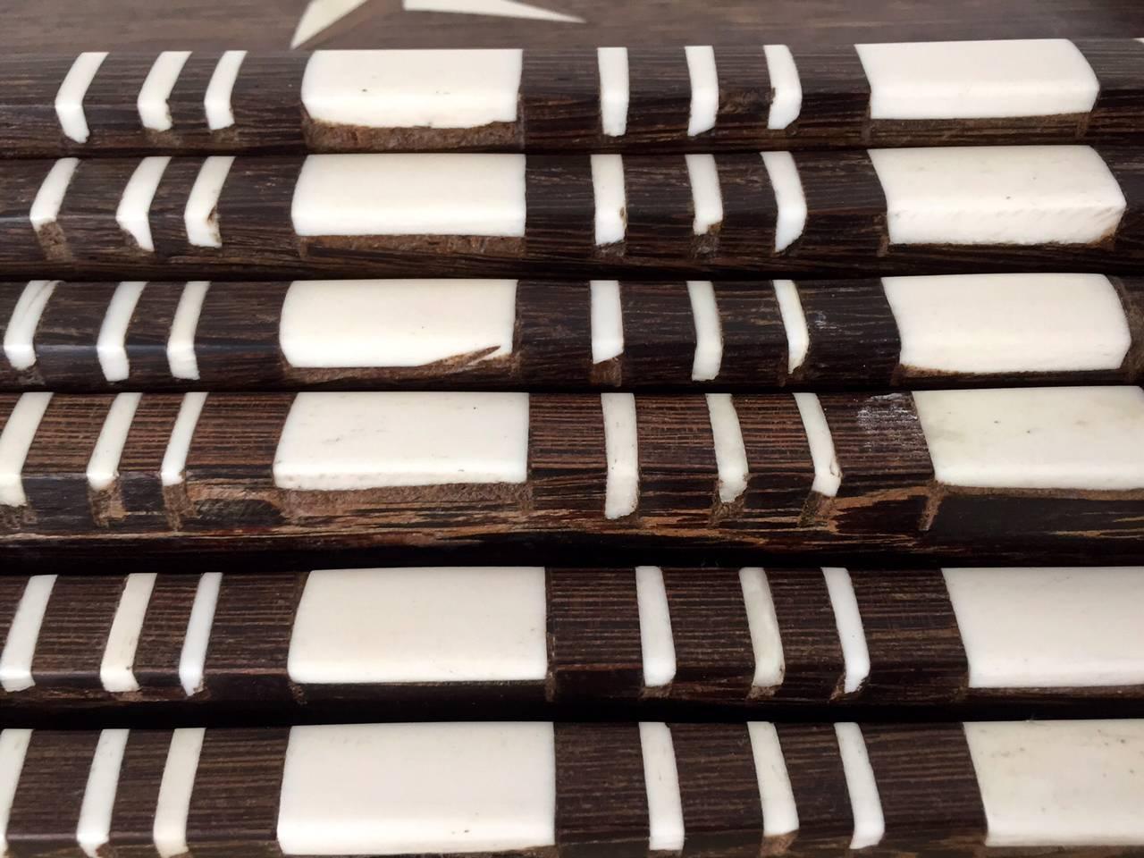 A stack of six antique wood trays with bone inlays In Good Condition For Sale In Atlanta, GA