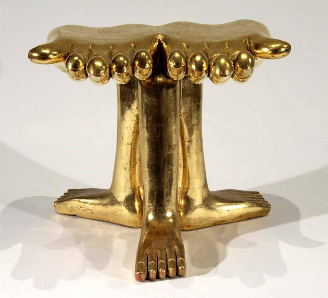 An iconic foot sculpture by the celebrated Mexican-American surrealist artist Pedro Friedeberg, circa 1960s. A rare rendition in large size with two open palms supported by three legs and feet. Wood construction with gold leaves on surface.