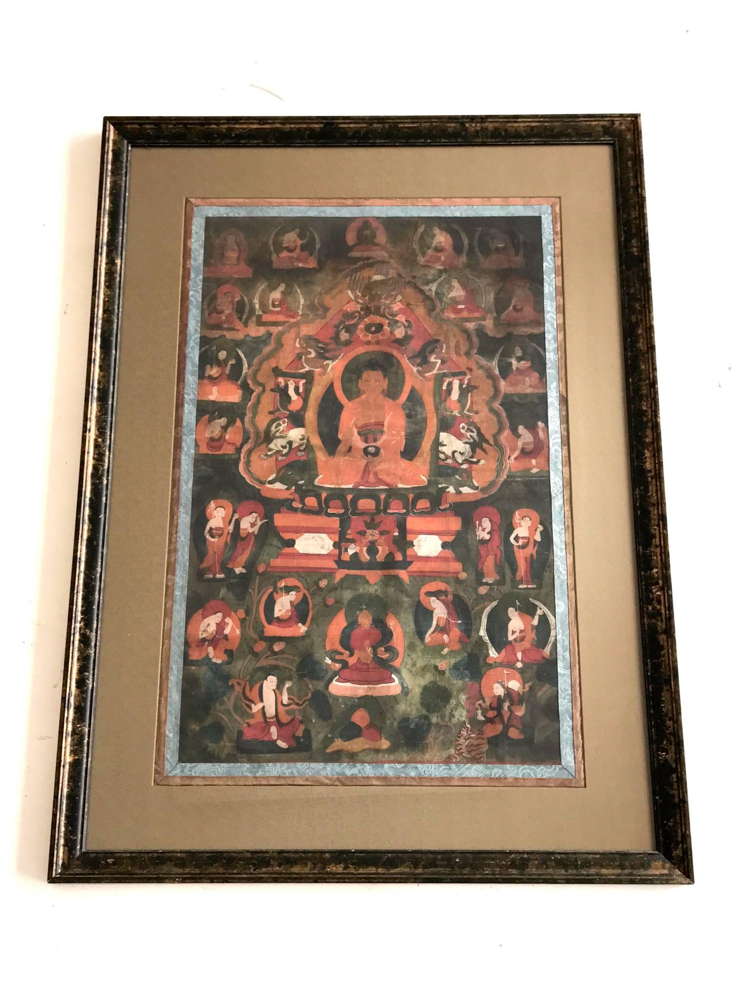 An antique Tibetan Thankga depicting Amitabha and surrounding deities, circa late 19th century. The center Amitabha is in a meditation form holding a black beggar's bowl. In the Mahayana Tradition of Buddhism, Amitabha is a celestial Buddha: the