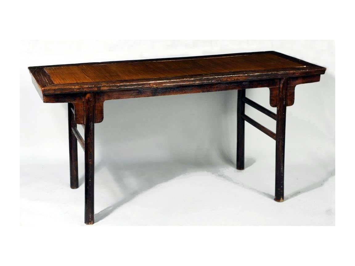 A Ming-dynasty style Chinese recessed-leg scholar's painting table with bamboo stripes inlay. It appears to be from early to middle period of Qing dynasty, with single-panel top set with lacquered bamboo strips. Mortise and tenon construction in
