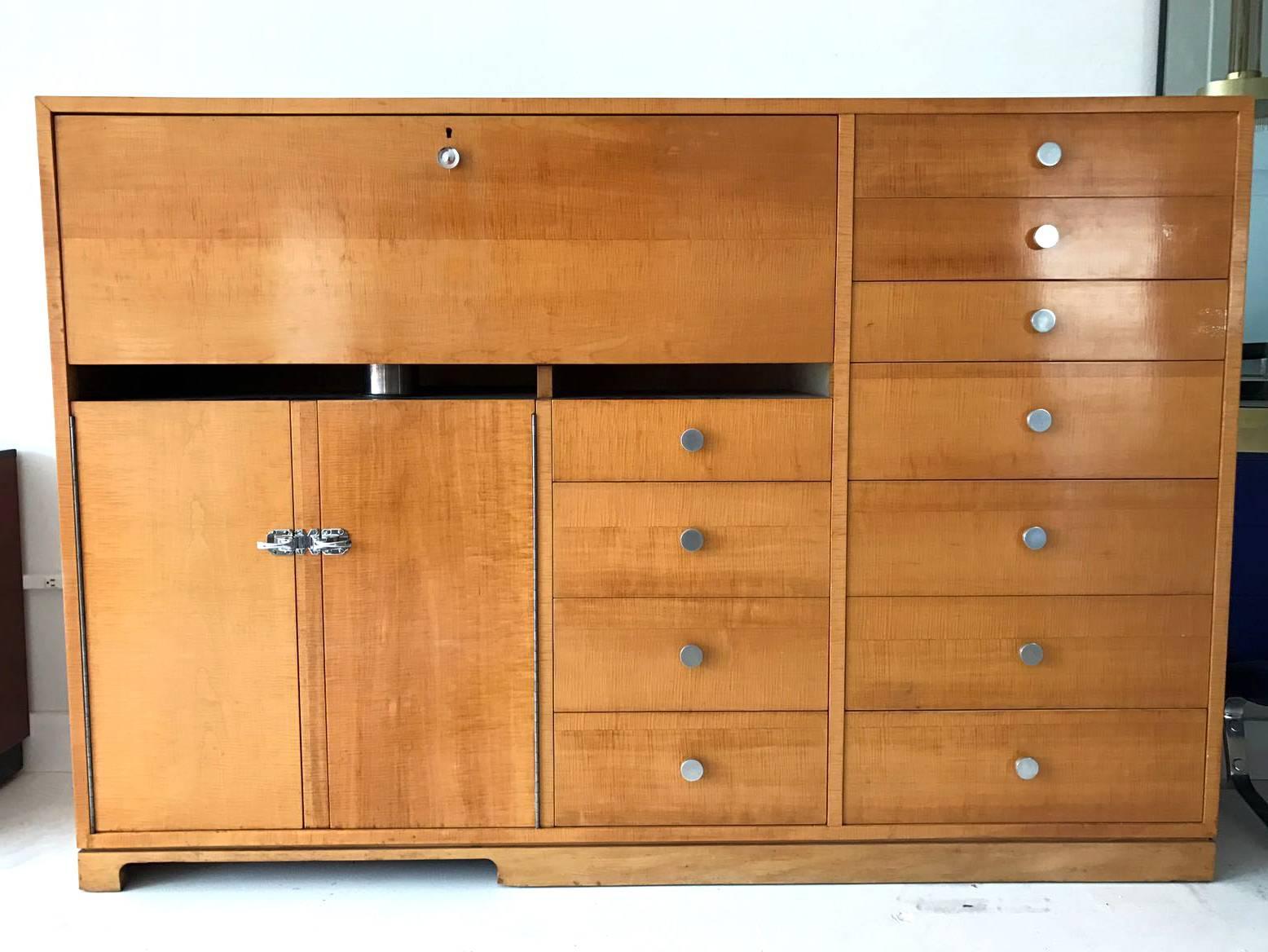 A one of a kind unique custom piece from celebrated American architect Philip Johnson (1906-2005). This tiger maple bar cabinet was designed by Philip Johnson for the NYC residence of Williams A.M. Burden Jr. (1906-1984), an long-term ex-president