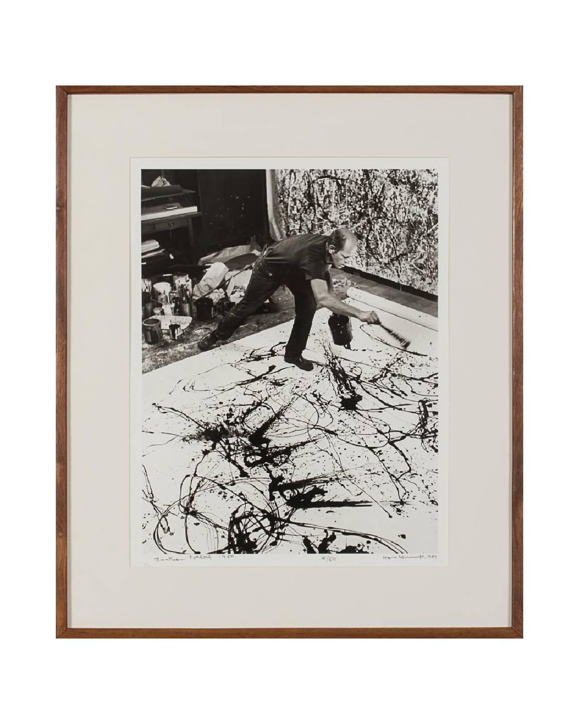 Artist: Hans Namuth (1915-1990)
Title: Jackson Pollock at Work, 1950 (Printed in 1989)
Medium: Silver gelatin print.
Edition: both 4/50
Both titled, editioned, signed and dated on the lower margin as shown. 
Framed dimensions: 24.5 H x 20.5