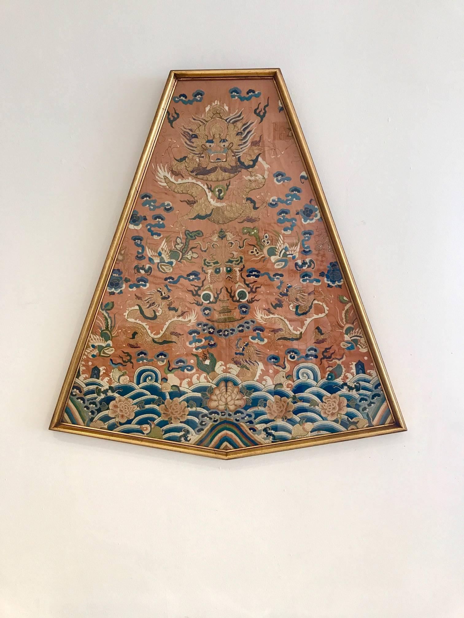 Framed large front fragment of Chinese imperial dragon robes, circa 19th century Qing dynasty. Artistically presented in diamond-shape gilt frame, each salmon in the silk background and elaborately hand-embroidered and stitched in silk and metallic