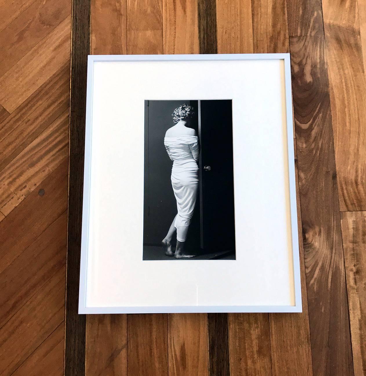 Artist: Philippe Halsman (1906-1979)
Title: Marilyn Entering The Closet
Medium: gelatin silver prints
Date: 1952 printed in 1981
Edition: 186/250
Size: image 12.5