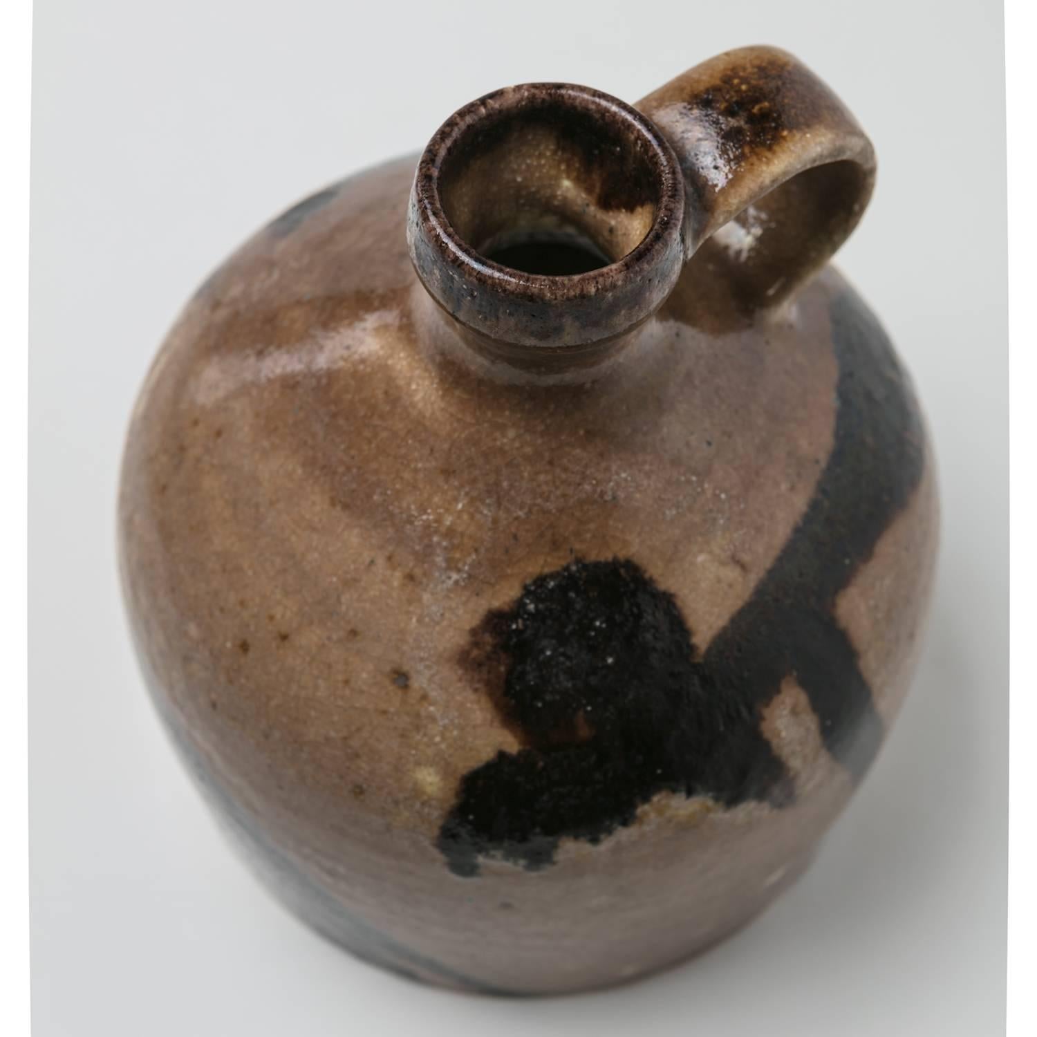 Amazing glazed ceramic bottle by Guido Gambone.
Abstract dark brown decoration.