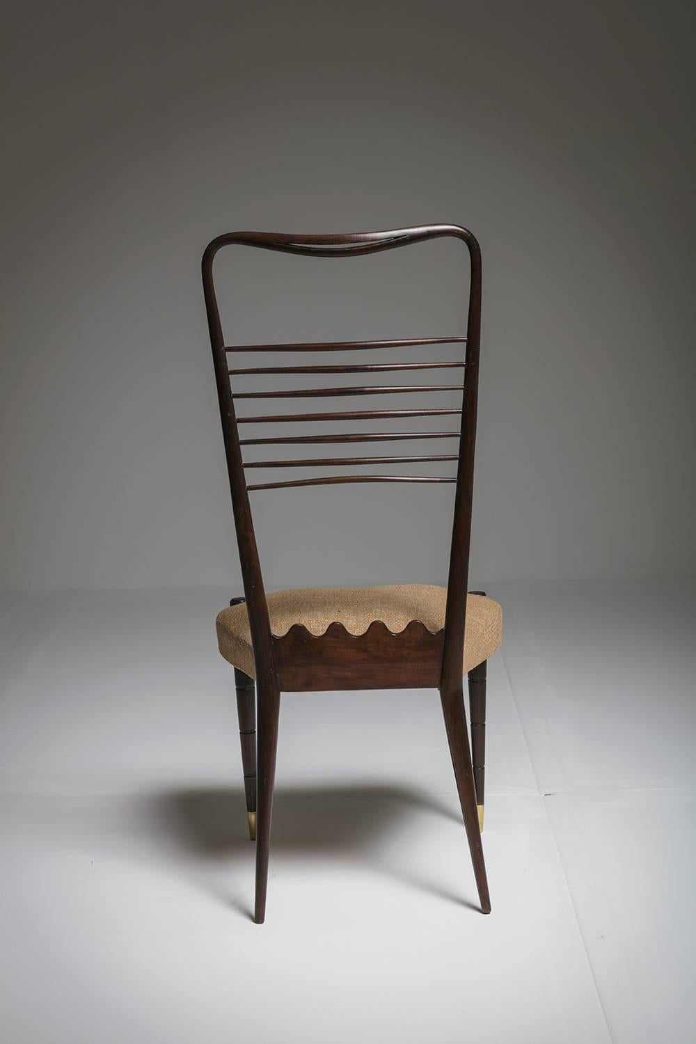 Graceful hi-back chair attributed to Guglielmo Ulrich.
Finest example of maximum care to every detail of the chair where no element is left aside.
 