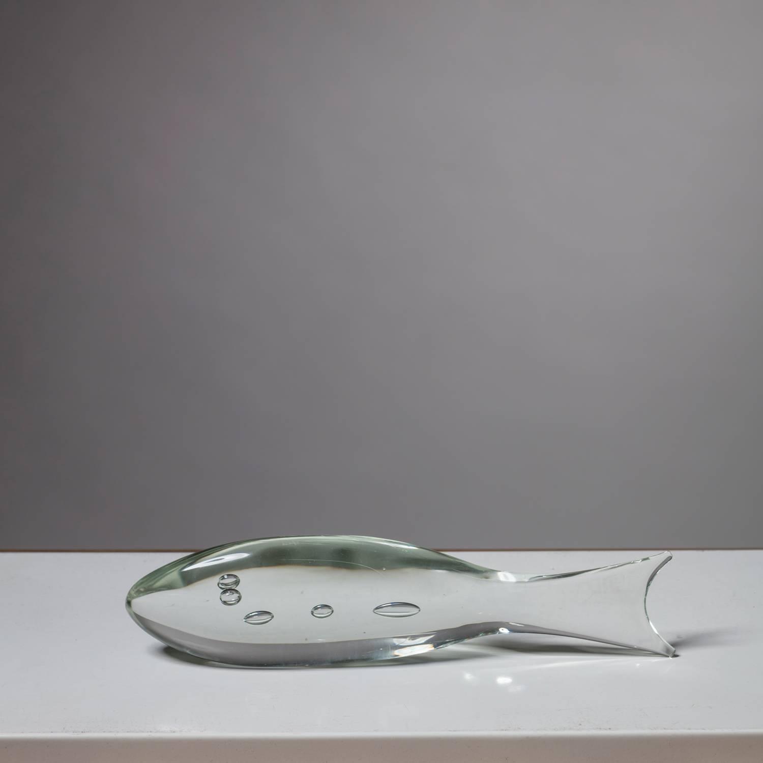 Murano glass fish by Cenedese.
Solid glass lean shape with bubbles.