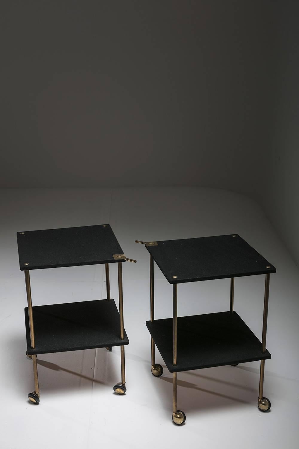 Rare set of two side tables T9 by Luigi Caccia Dominioni for Azucena.
Wood panels covered with textile, brass frame.
 