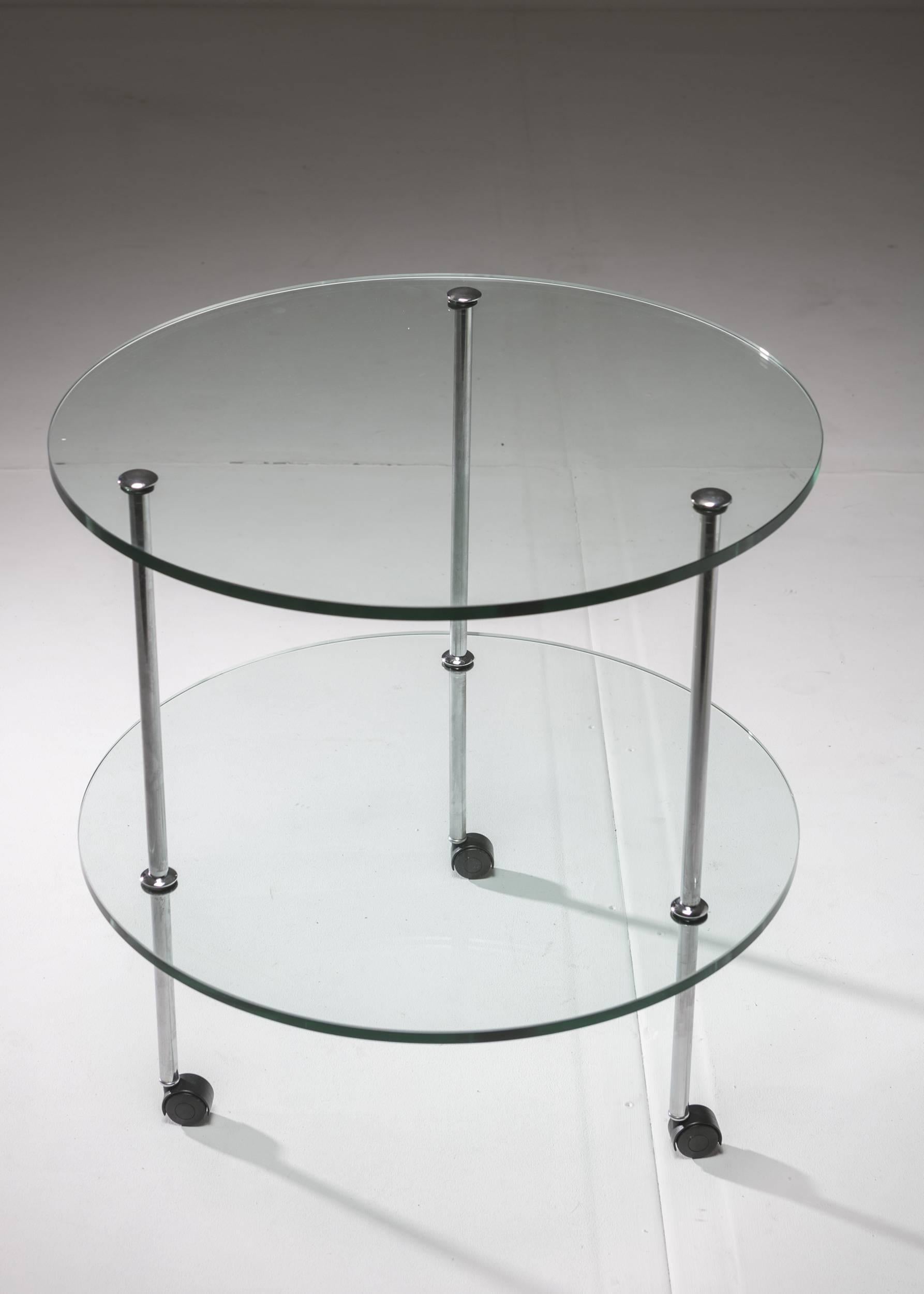 Glass cart model T6 by Luigi Caccia Dominioni for Azucena.
Thick crystal tops and chromed brass frame.
 