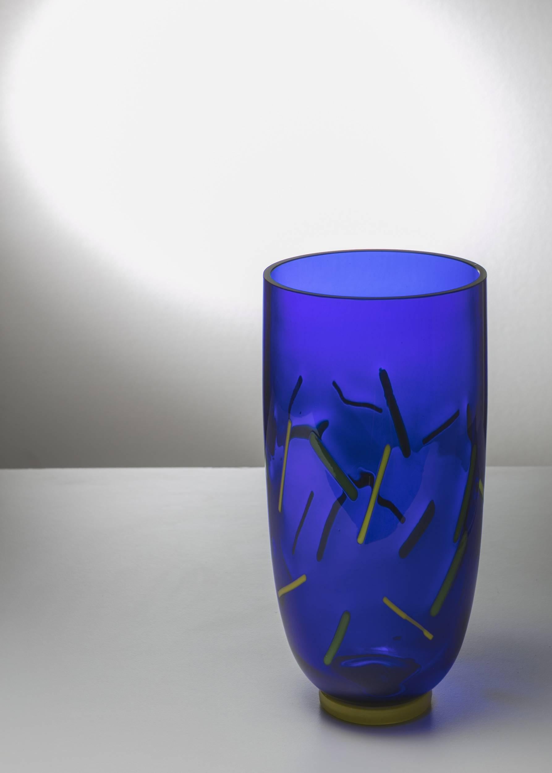 Remarkable Murano glass vase by Barovier and Toso.
Blue body with yellow and green inclusions.