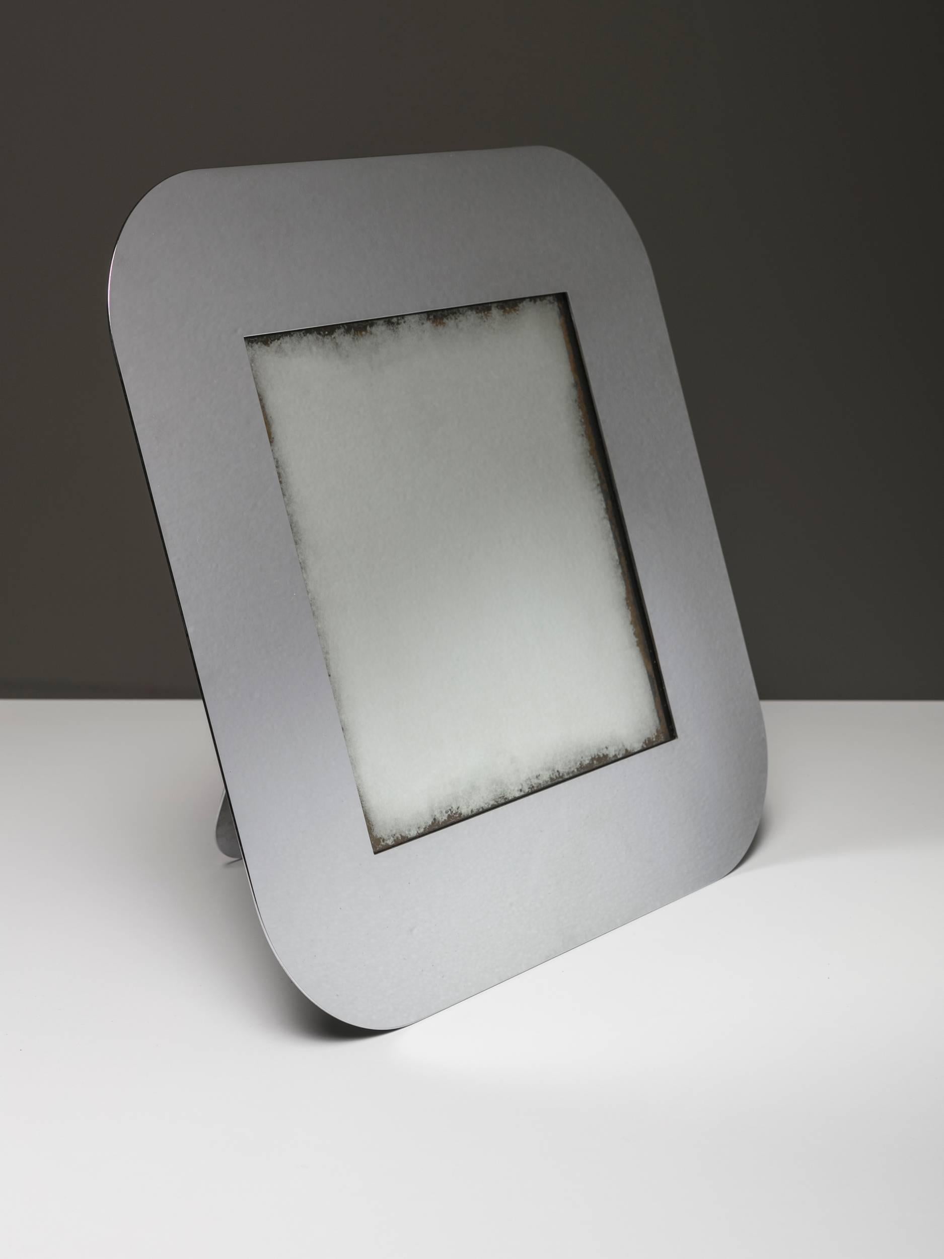 Large table mirror by Sergio Mazza and Giuliana Gramigna for Quattrifolio.
Chrome frame and folding arm.