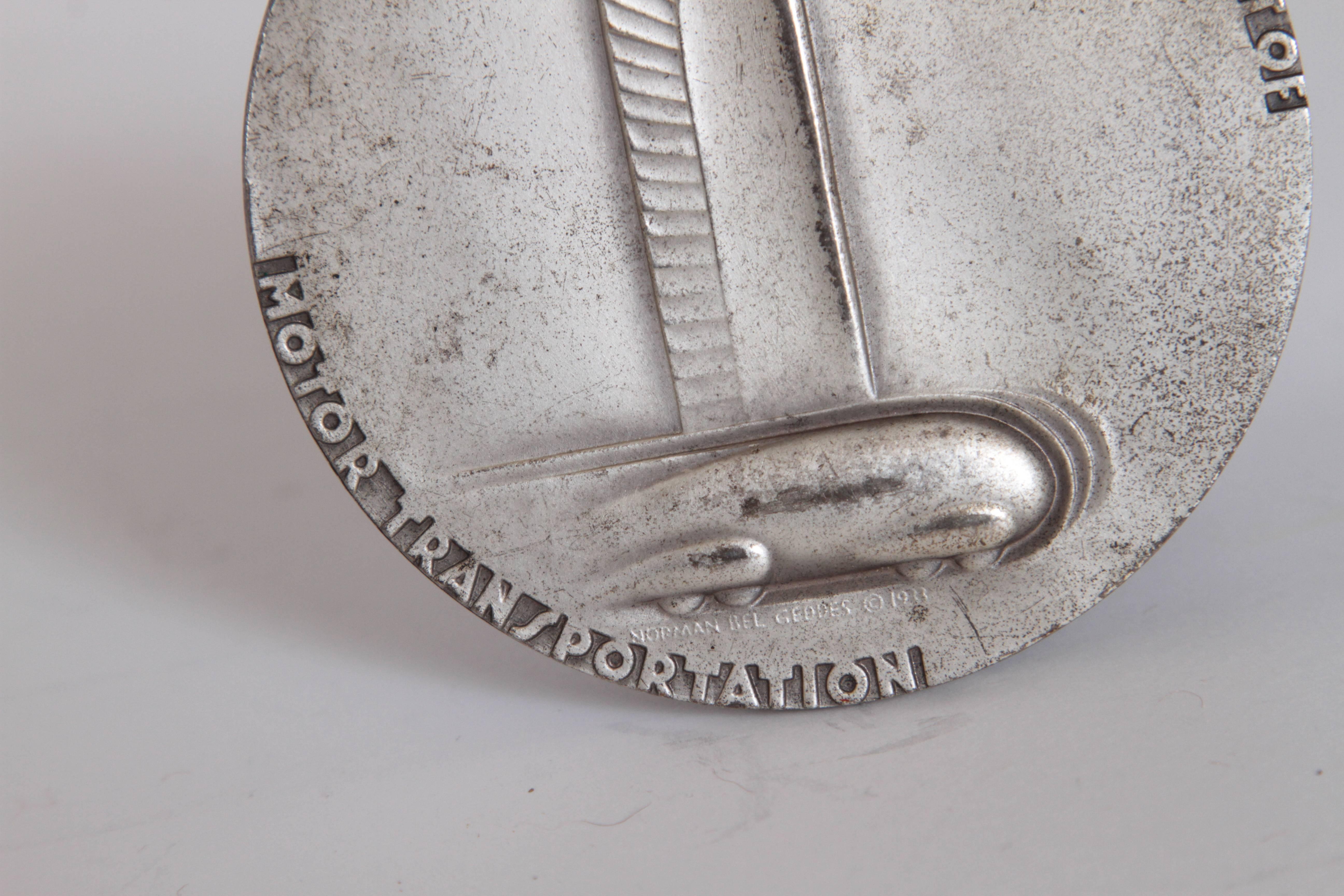 Machine Age Art Deco Norman Bel Geddes Medallion, General Motors Anniversary

Norman Bel Geddes General Motors 25th Anniversary, 1933 design. 
Iconic Bel Geddes design, executed by Rene Chambellan for the Medallic Art Company of New York.

3
