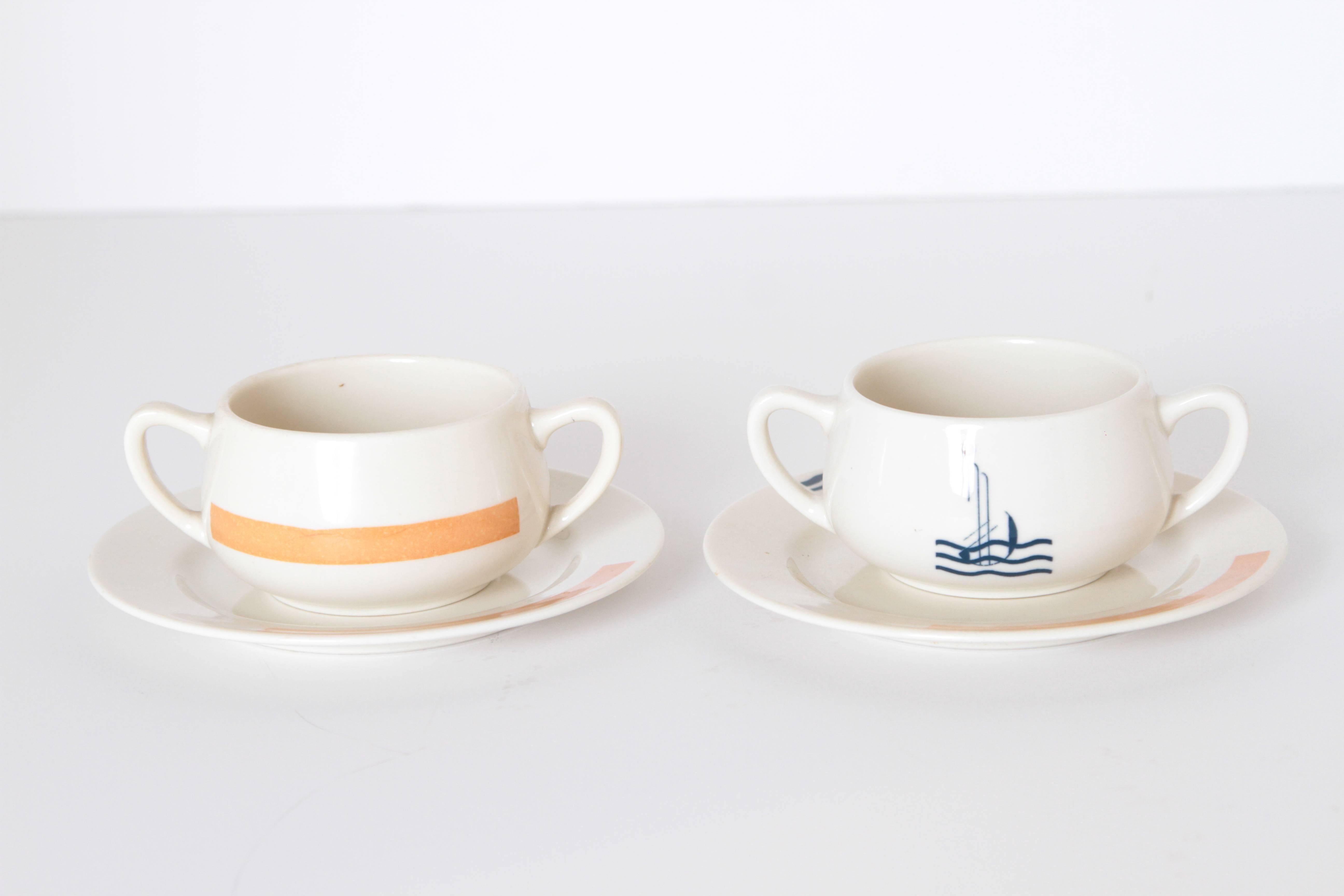 Machine Age Art Deco Eugene Schoen Pair Signed Leviathan Cruise Ship Serveware.  Streamline modernist ceramic.
2 matched cup/saucer pairs (4 pieces total) available.

Difficult to source small plate and bouillon bowl for the iconic SS Leviathan