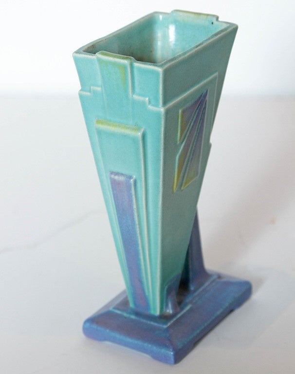 This is one great form with lots of angles and great colors.
Complementary with other period pottery designs such as Roseville's Futura, Muncie Rombic, Shelly, Clarice Cliff, etc.

Very good condition. One of the few examples of extreme modernist