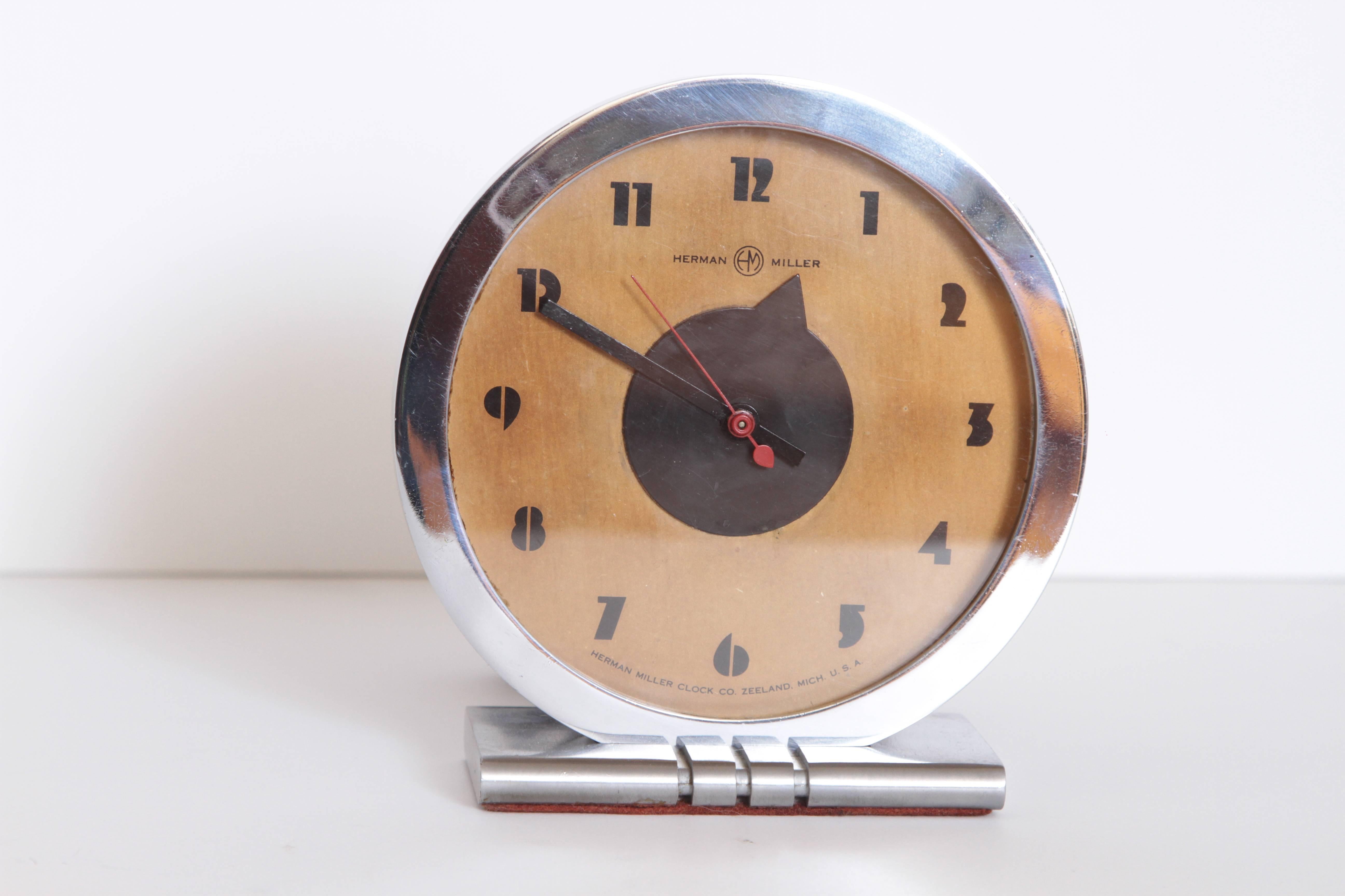 Machine Age Art Deco Gilbert Rohde for Herman Miller Iconic Desk Clock

Original model, with the Herman Miller signatures and stylized Rohde numerals.
Brushed chrome base and bright chrome bezel, original combination.
Original iconic hands,