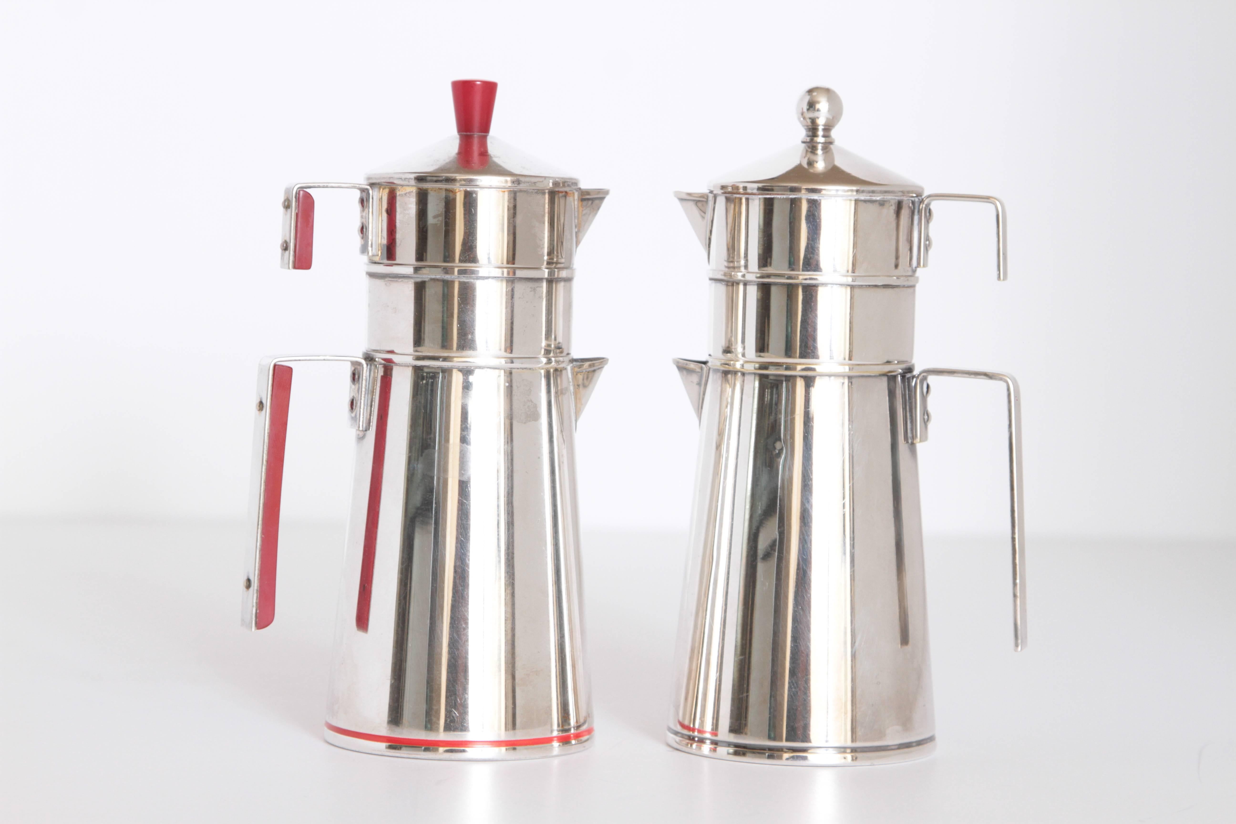 Emil Schuelke for Napier Machine Age Art Deco individual coffee service.

Two rare individual coffee service sets by Schuelke for Napier. Documented patented design.
Schuelke also designed the famous Penguin Shaker for Napier and a Conical