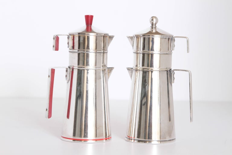 Emil Schuelke for Napier Machine Age Art Deco individual coffee service.

Two rare individual coffee service sets by Schuelke for Napier. Documented patented design.
Schuelke also designed the famous Penguin Shaker for Napier and a Conical
