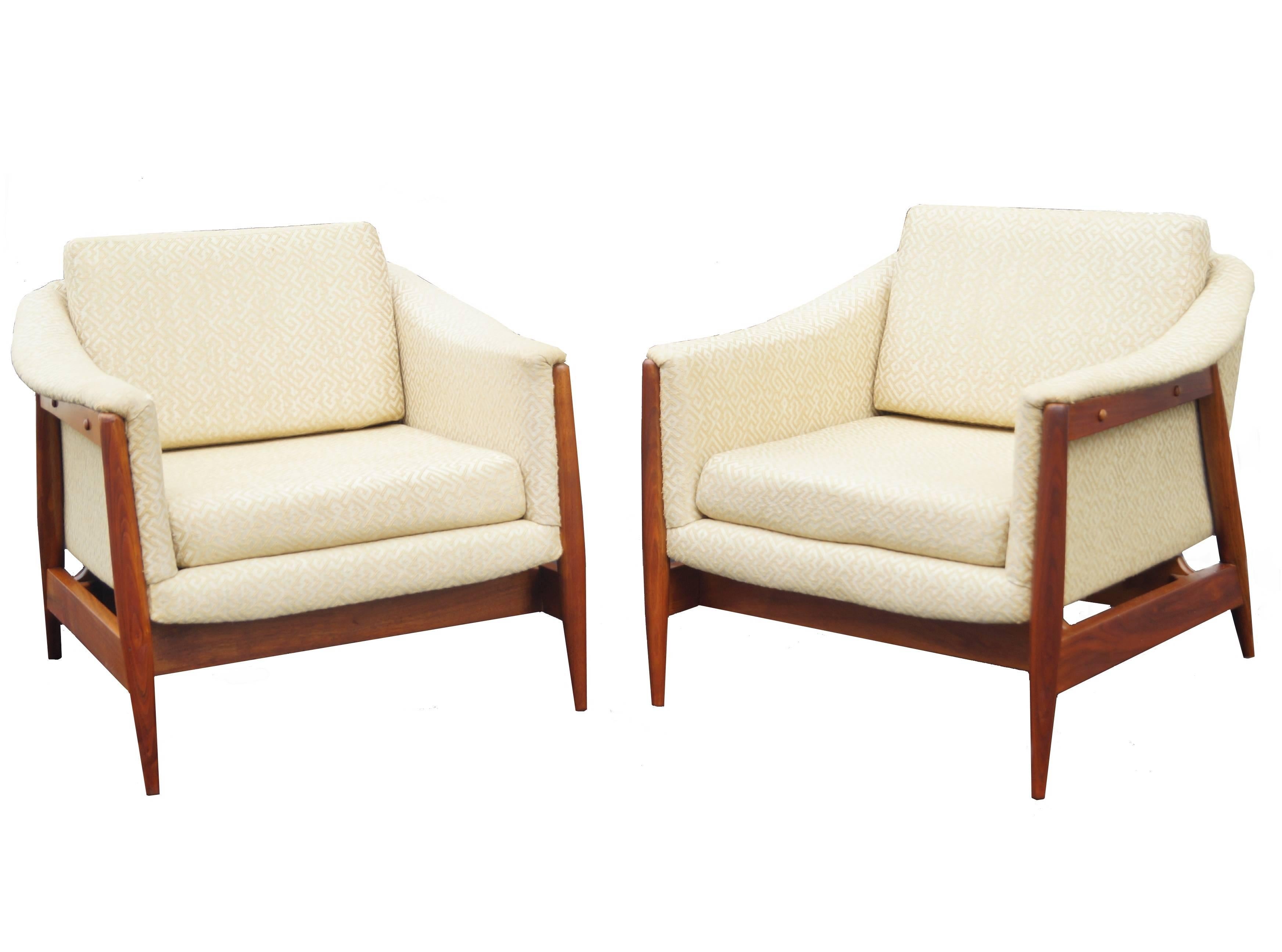 Pair of 1950s DUX style Danish Mid-Century Modern lounge chairs.