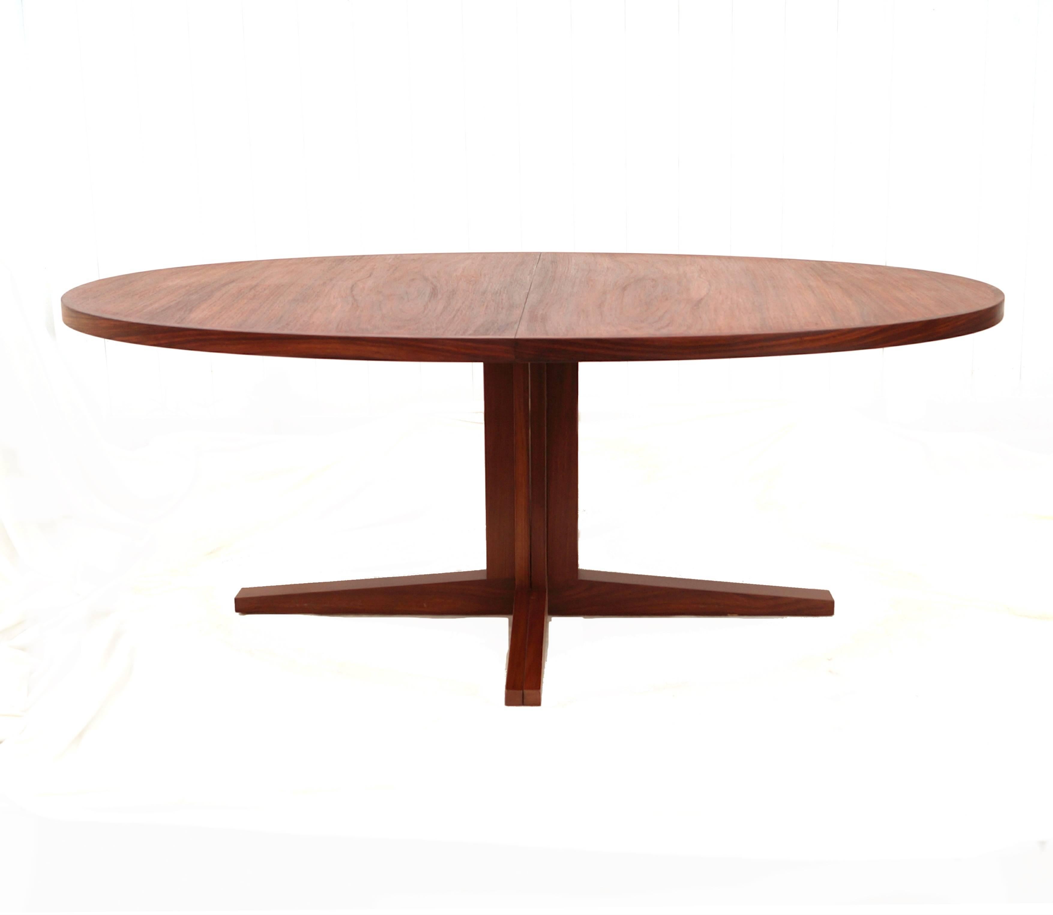 John Mortensen expandable rosewood dining conference table. Measure: 74.5