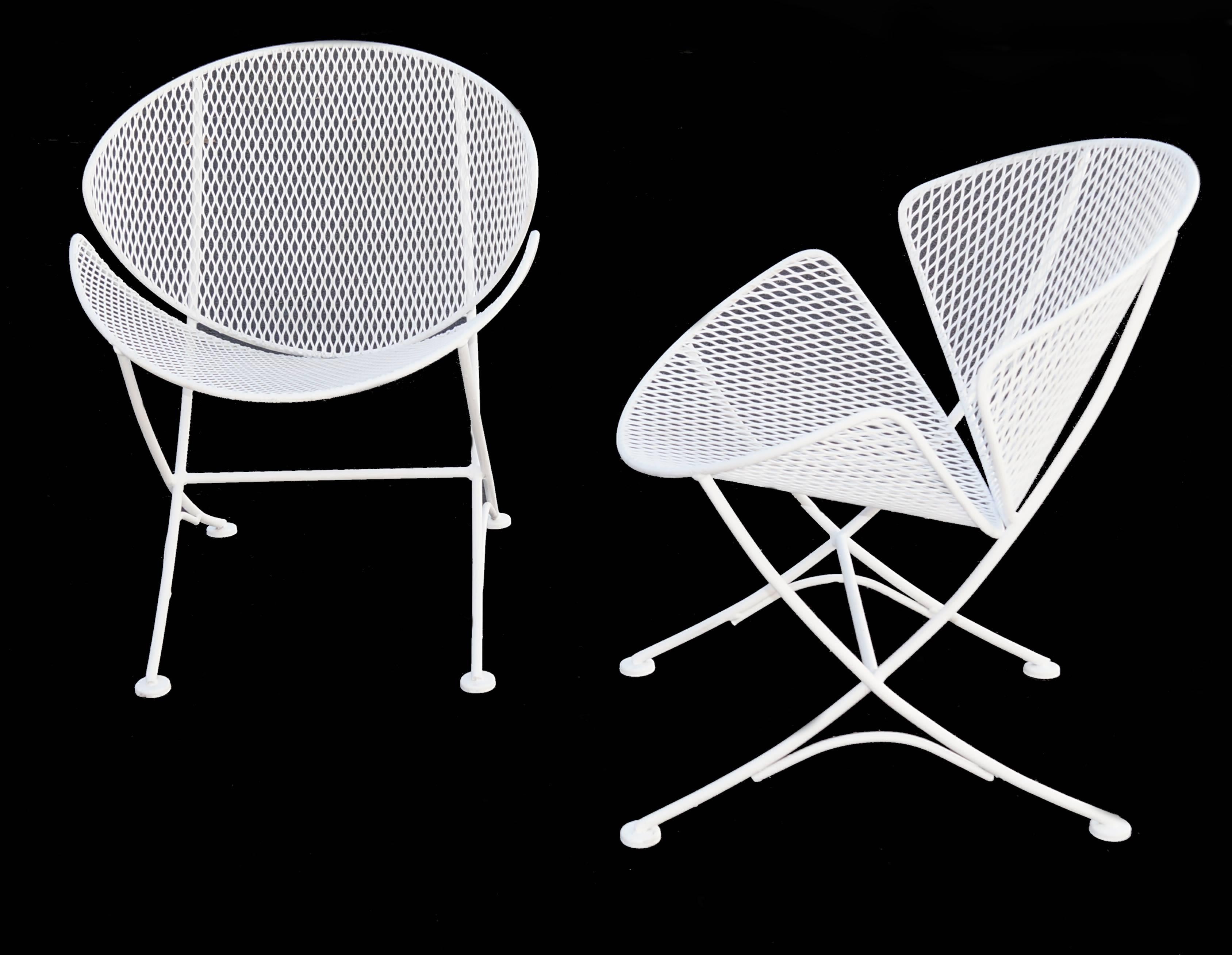 Set of four John Salterini Mid-Century Modern Clamshell chairs.