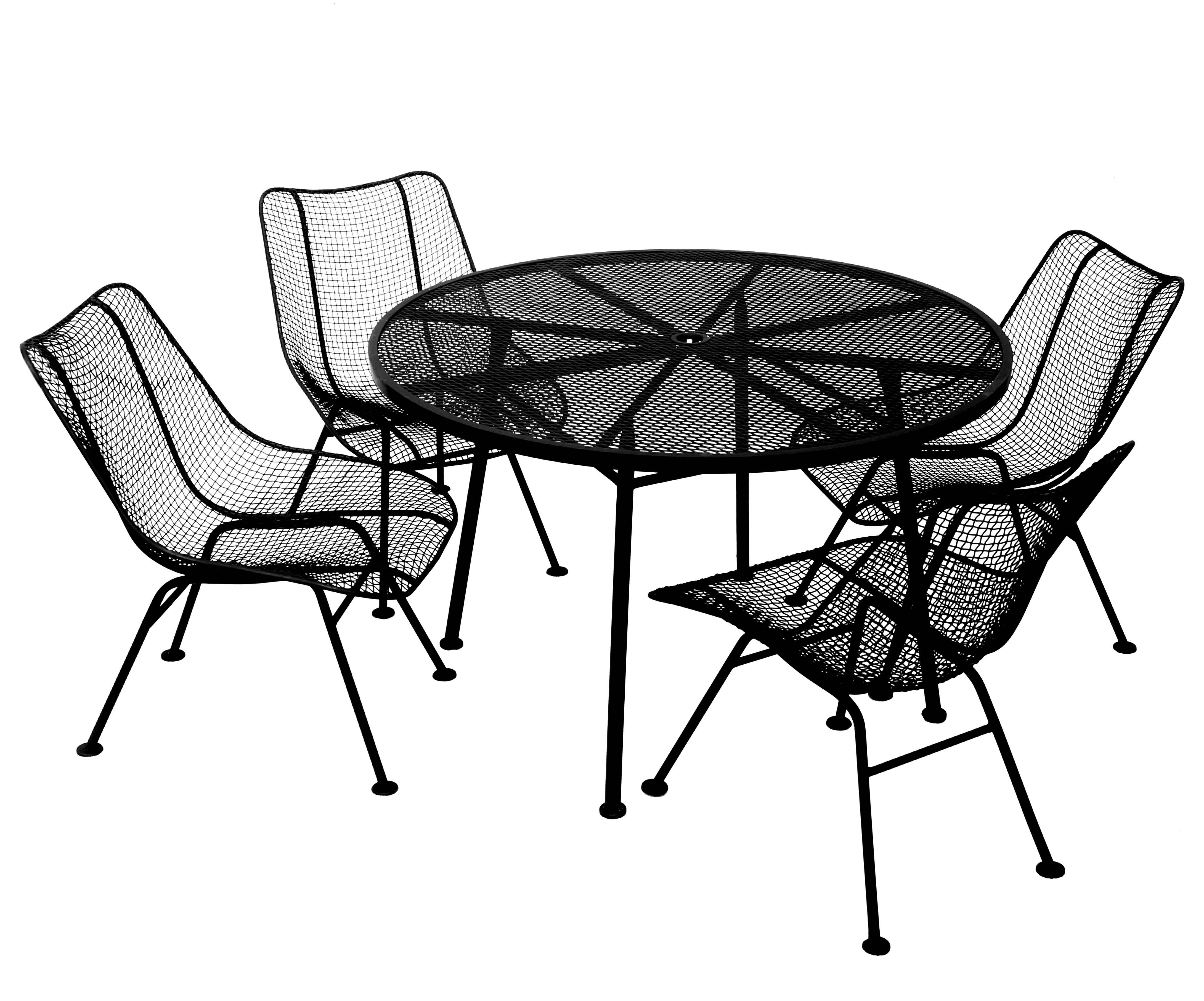 Russell Woodard sculptura outdoor indoor patio dining set table and four chairs. The table measures 41.50