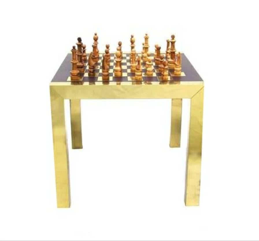 This is a rare Paul Evans chess gaming set. It includes the table and playing pieces. The table is 32