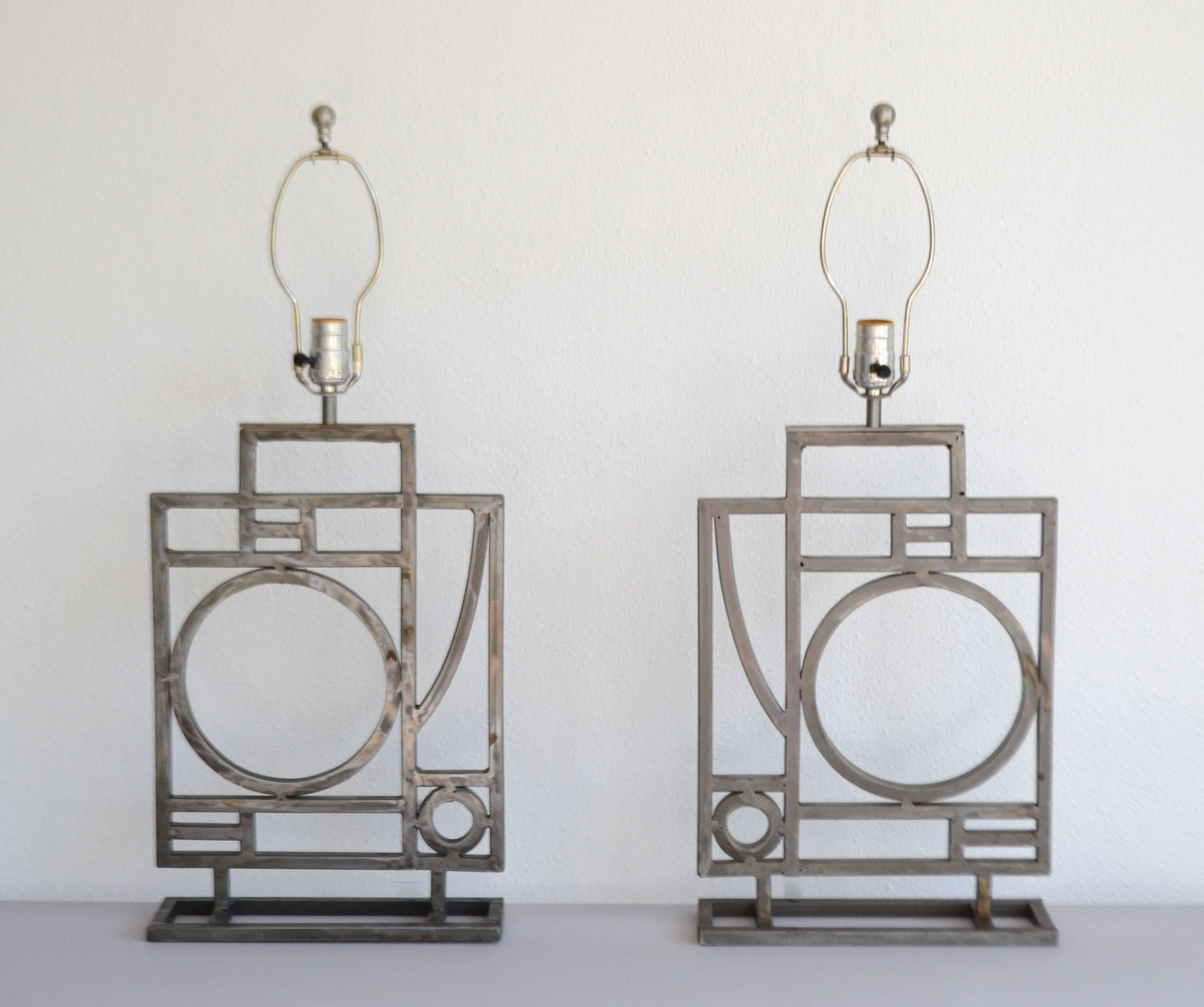 
Stunning pair of brushed metal Postmodern geometrical form table lamps by Robert Sonneman for George Kovacs, circa 1980s-1990.
Shades not included. Measurements:
Height to top of finial is 31.5