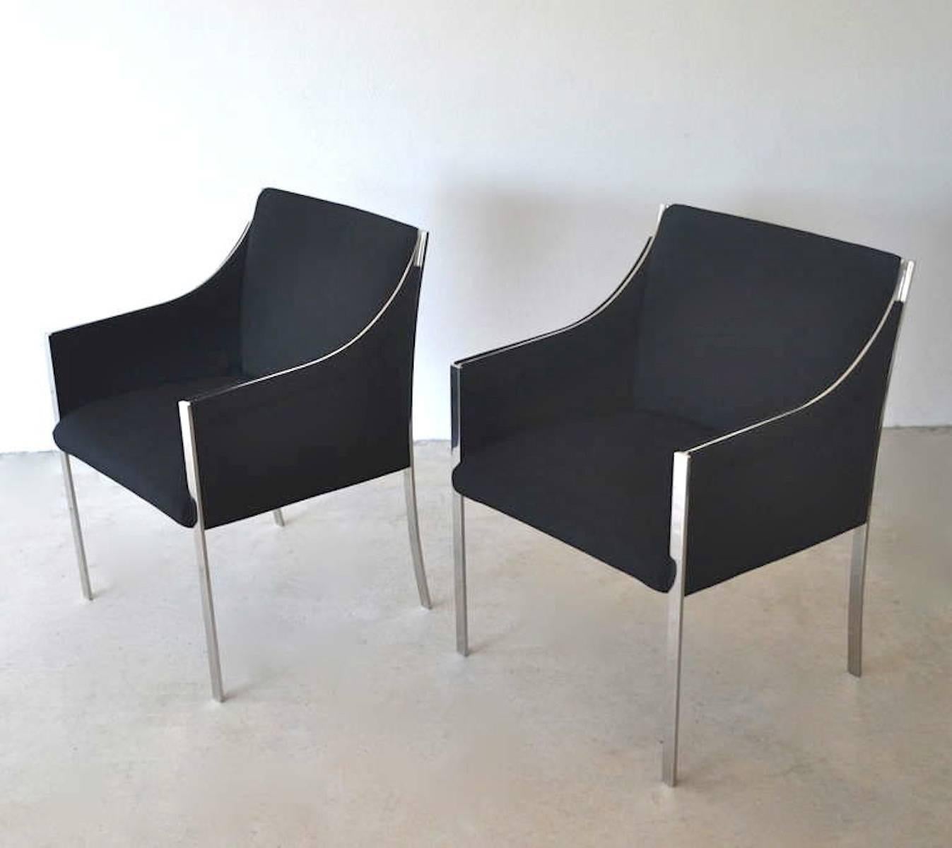 Pair of midcentury occasional chairs or lounge chairs by Jens Risom, circa 1960s. These sculptural armchairs/side chairs are upholstered in a black woven linen/wool fabric and accented with sleek chrome frames.
 