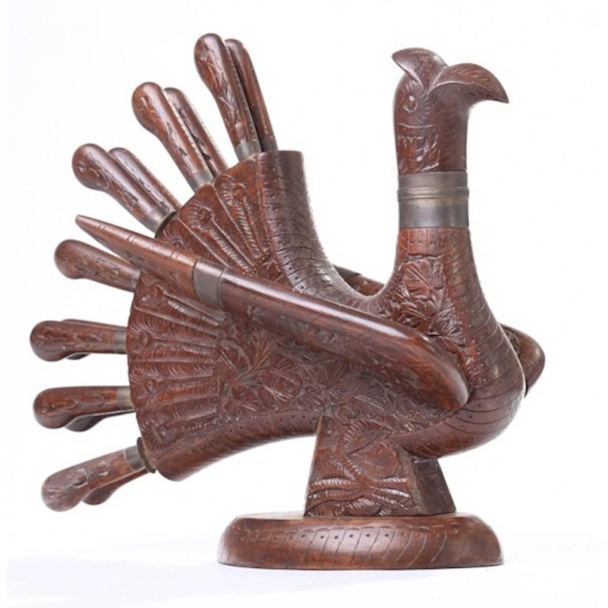 Midcentury intricately carved wooden figural turkey carving set of mahogany with decorative brass adornments, circa 1940s-1950s.
 