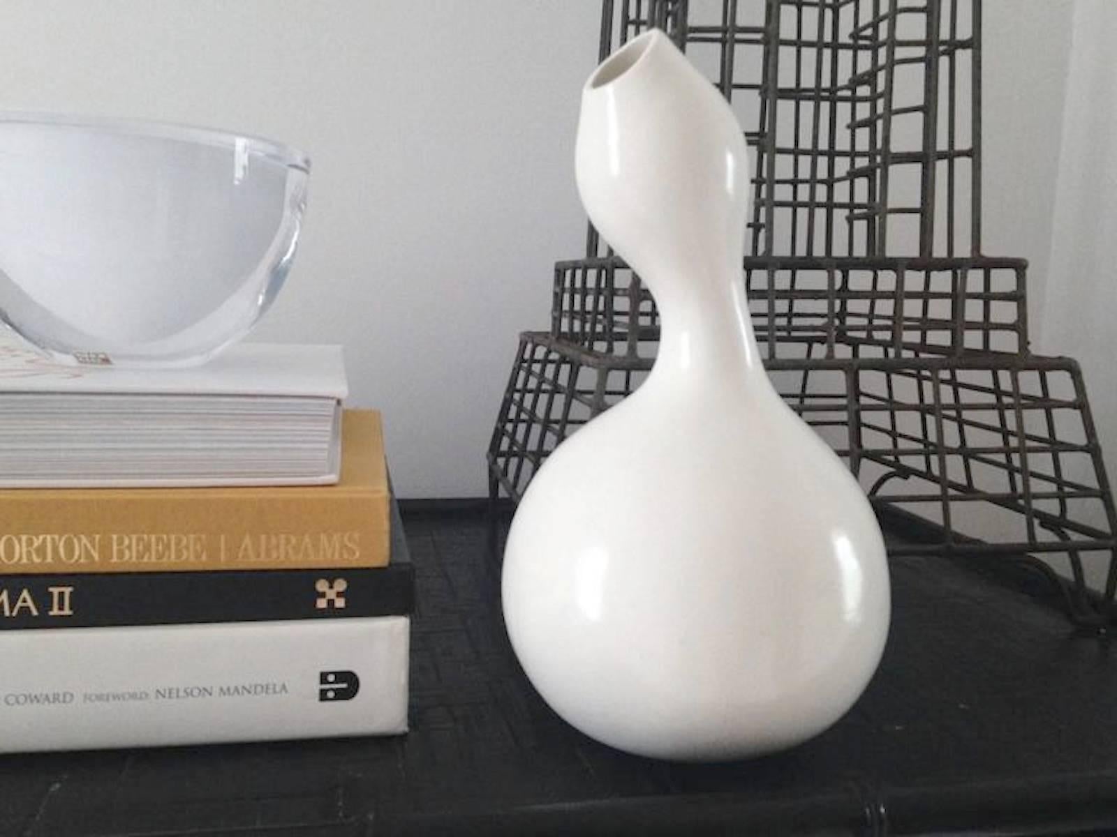 Striking Postmodern abstract gourd form vase, signed Lee, circa 1970. This stunning organic form ceramic sculpture is glazed in a Blanc de Chine eggshell finish.