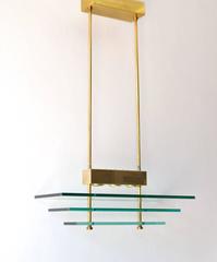 Postmodern Rectangular Form Polished Brass and Glass Pendant Chandelier