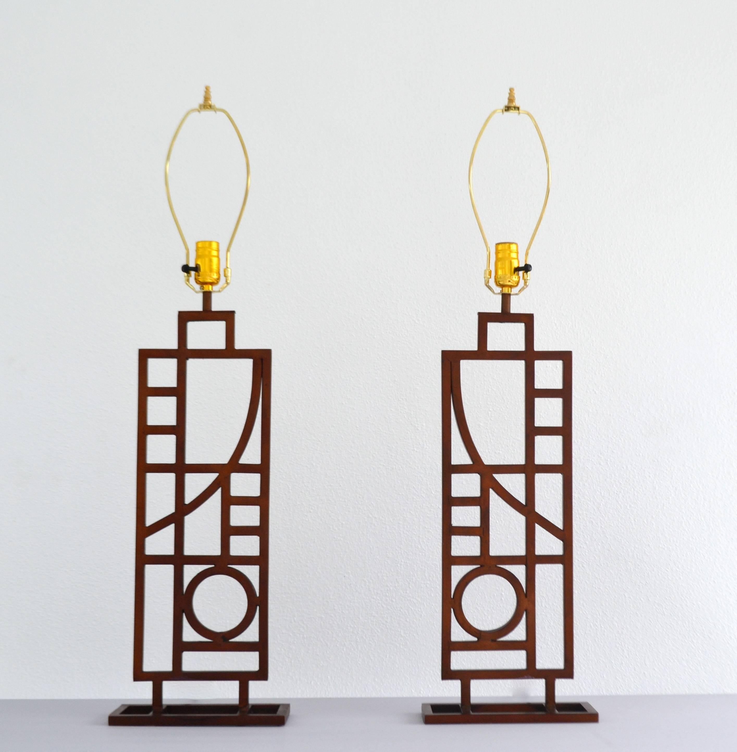 Striking pair of burnished copper Postmodern table lamps by Robert Sonneman for George Kovacs, circa 1980s. Lamps have been rewired with brass fitting. Shades not included.
Measurements:
Height to top of finial is 34
