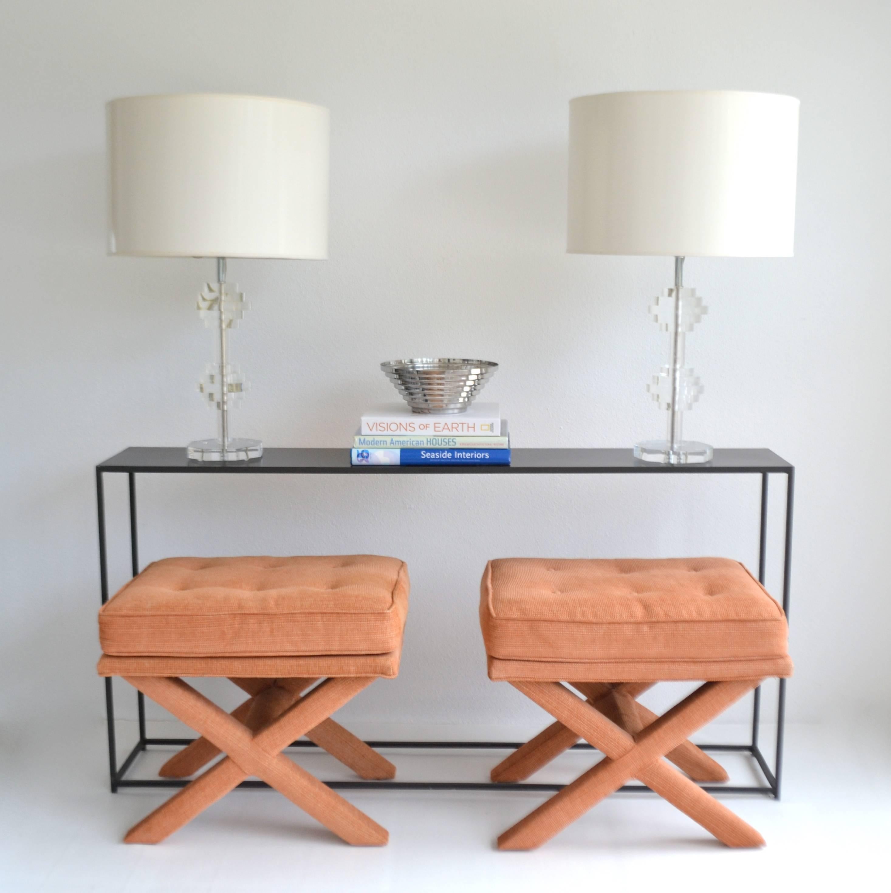 Striking pair of midcentury lucite table lamps, circa 1960s-1970s.
These sculptural lamps are designed of undulating stacked lucite discs and wired with chrome fittings.
Shades not included.
Measurements:
Overall: 29