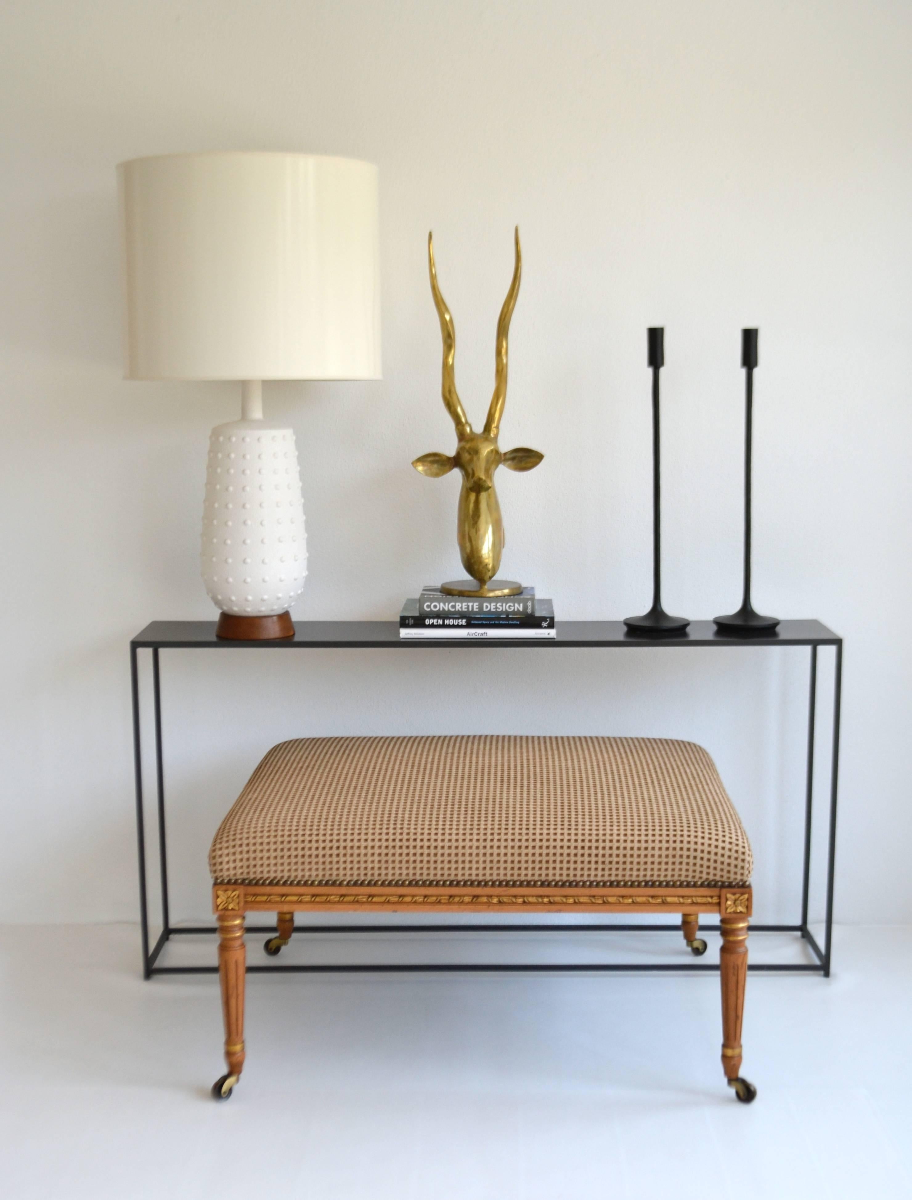 Mid-Century lava glazed jar form table lamp, circa 1950s-1960s. This sculptural ceramic white glazed lamp with elongated neck is mounted on a turned walnut base and wired with brass fittings. 
Shade not included:
Measurements:
Overall: 36