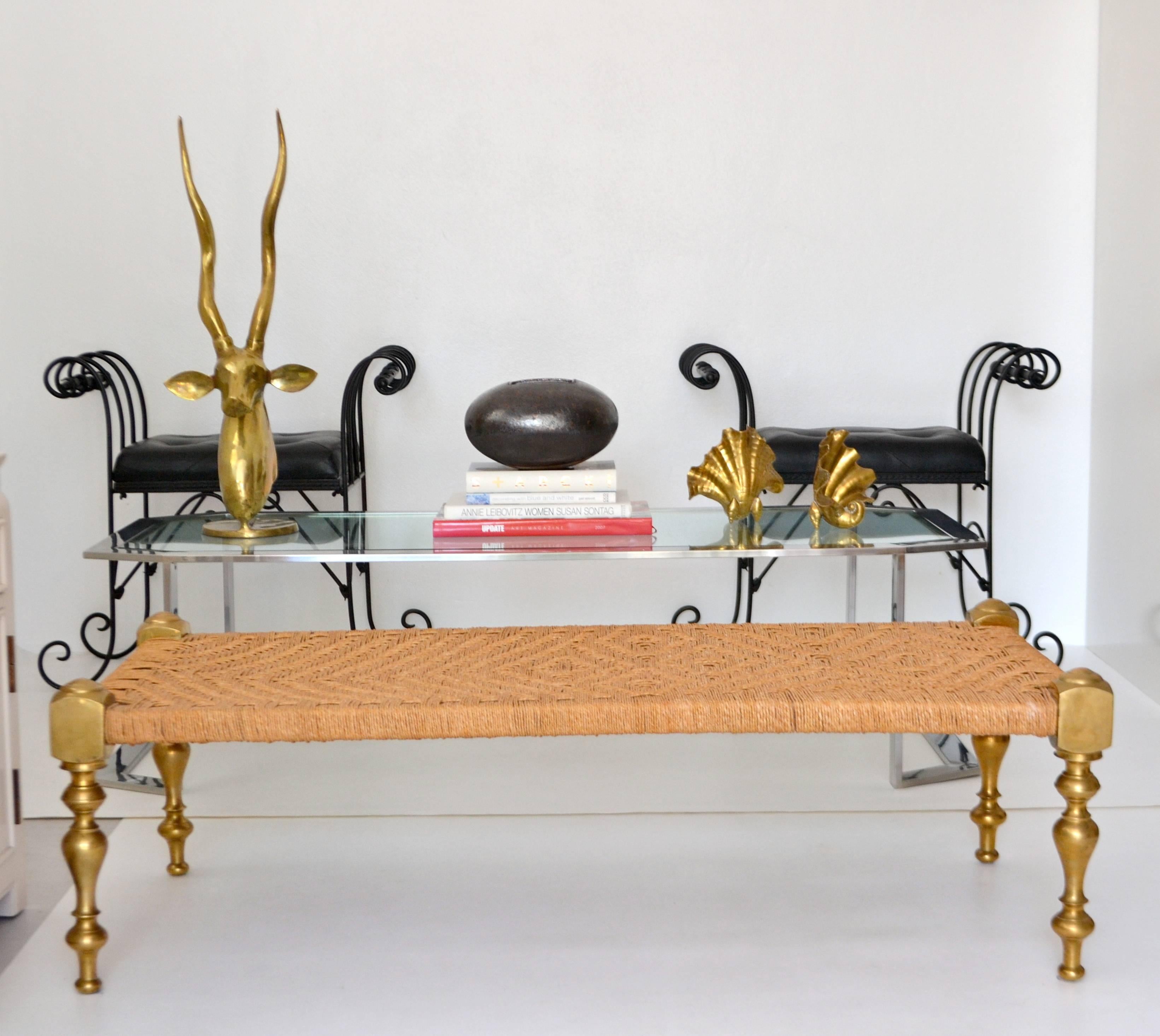 Striking Midcentury Anglo-Indian natural woven jute bench or stool on turned brass legs, circa 1960s-1970s. This artisan crafted bench could also be used versatility used as a coffee table or cocktail table.