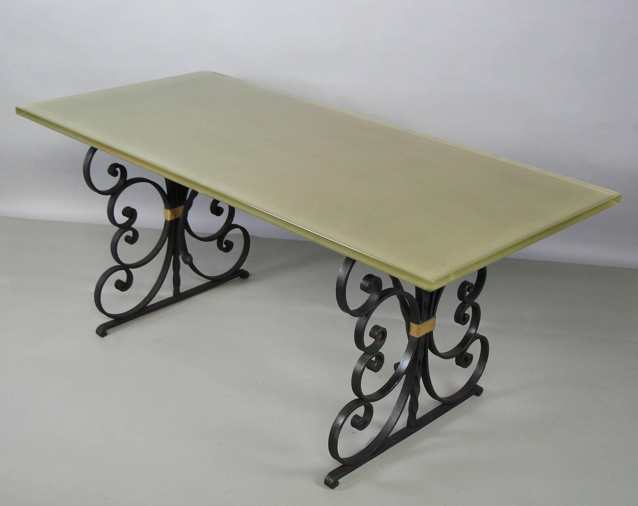 wrought iron and glass dining table