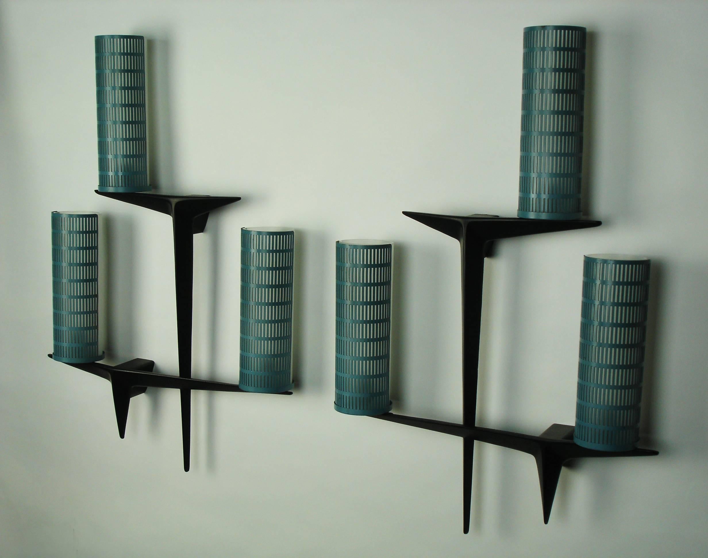 A pair of grey and black enameled metal sconces with sand blasted glass cylinders in each shade. Edited by Arlus.